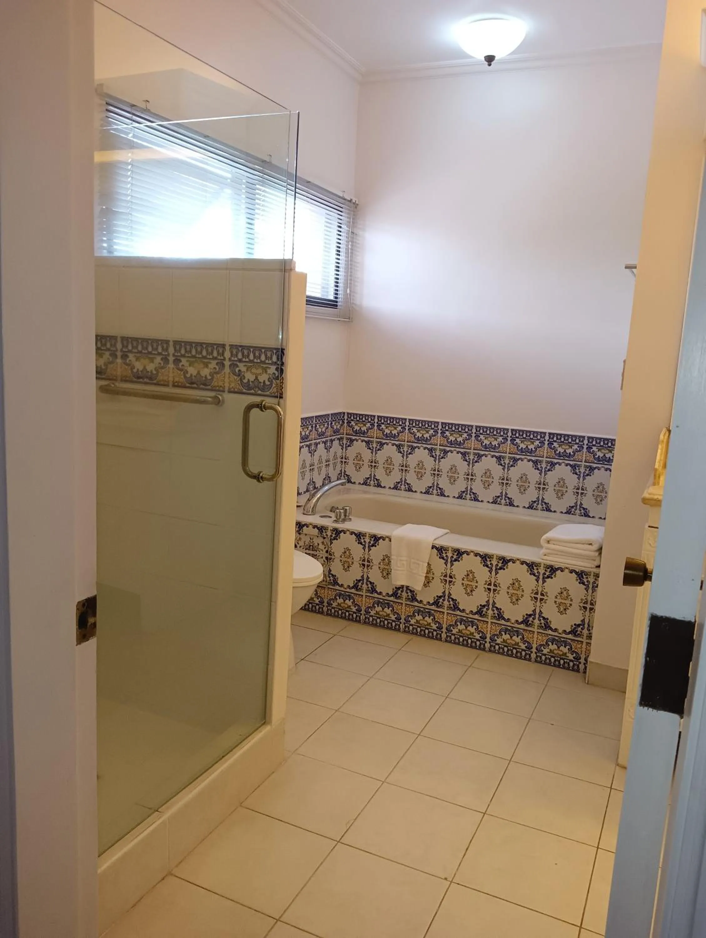 Shower in Sophia Suites Residence Hotel