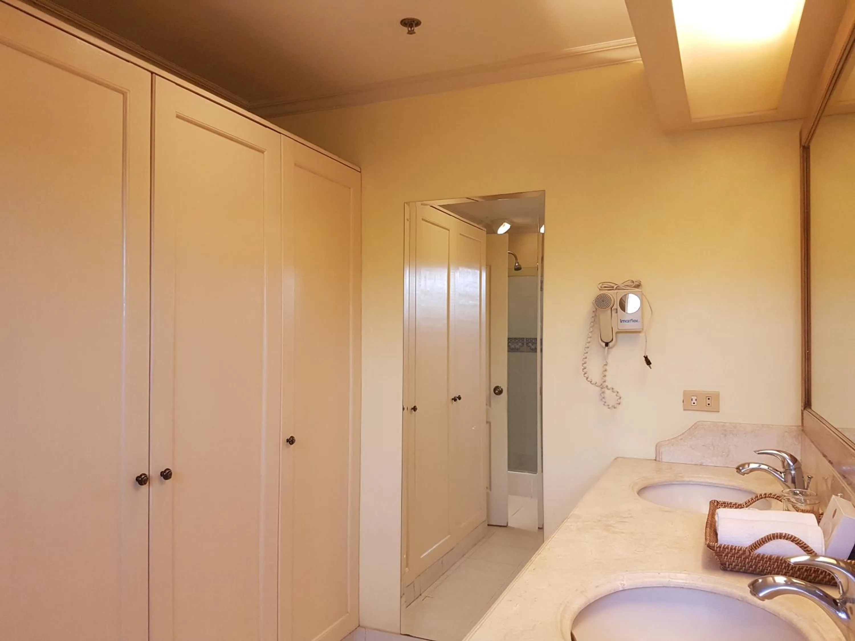 Bed in Sophia Suites Residence Hotel