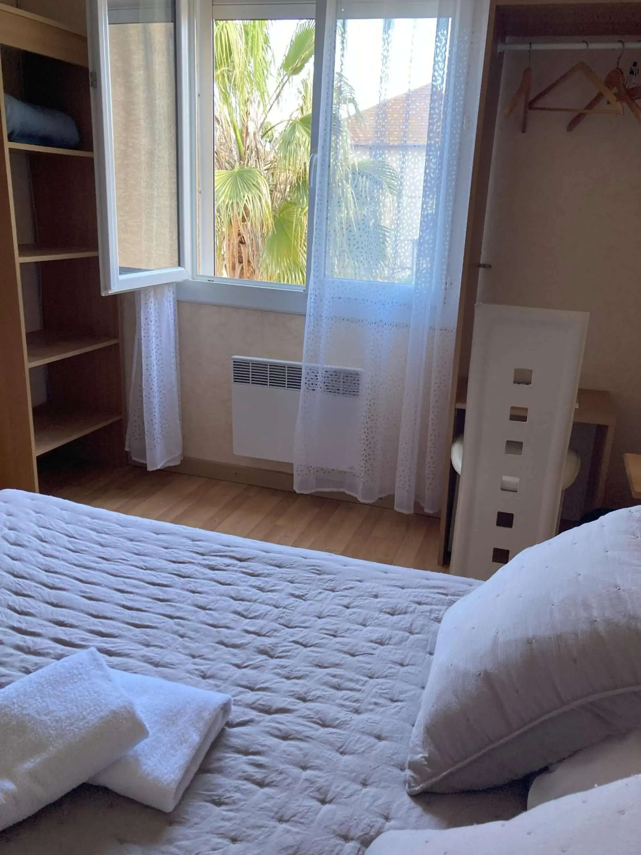 Photo of the whole room, Bed in Hôtel Le Gambetta Photo of the whole room, Bed in Hôtel Le Gambetta