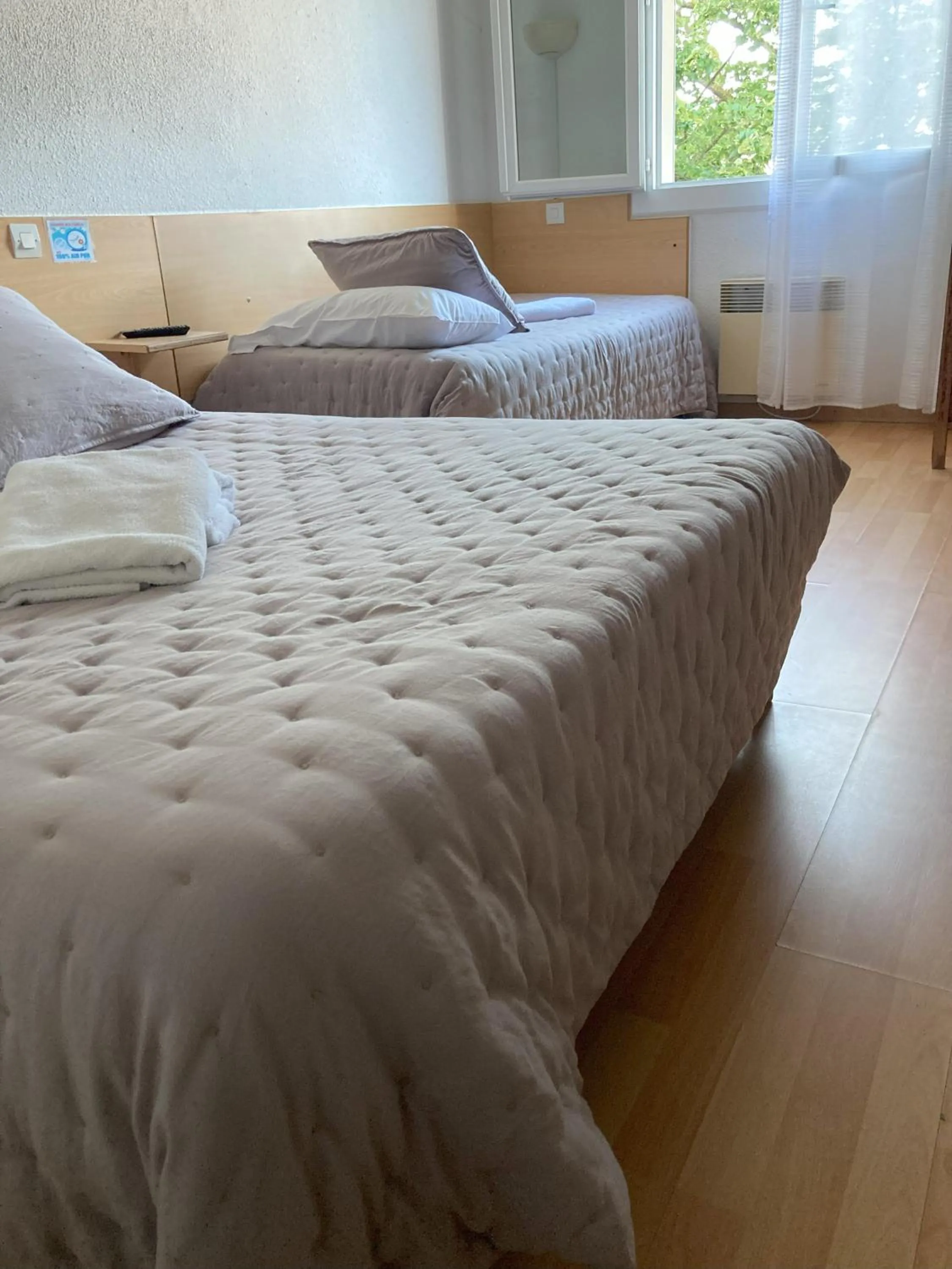 Photo of the whole room, Bed in Hôtel Le Gambetta