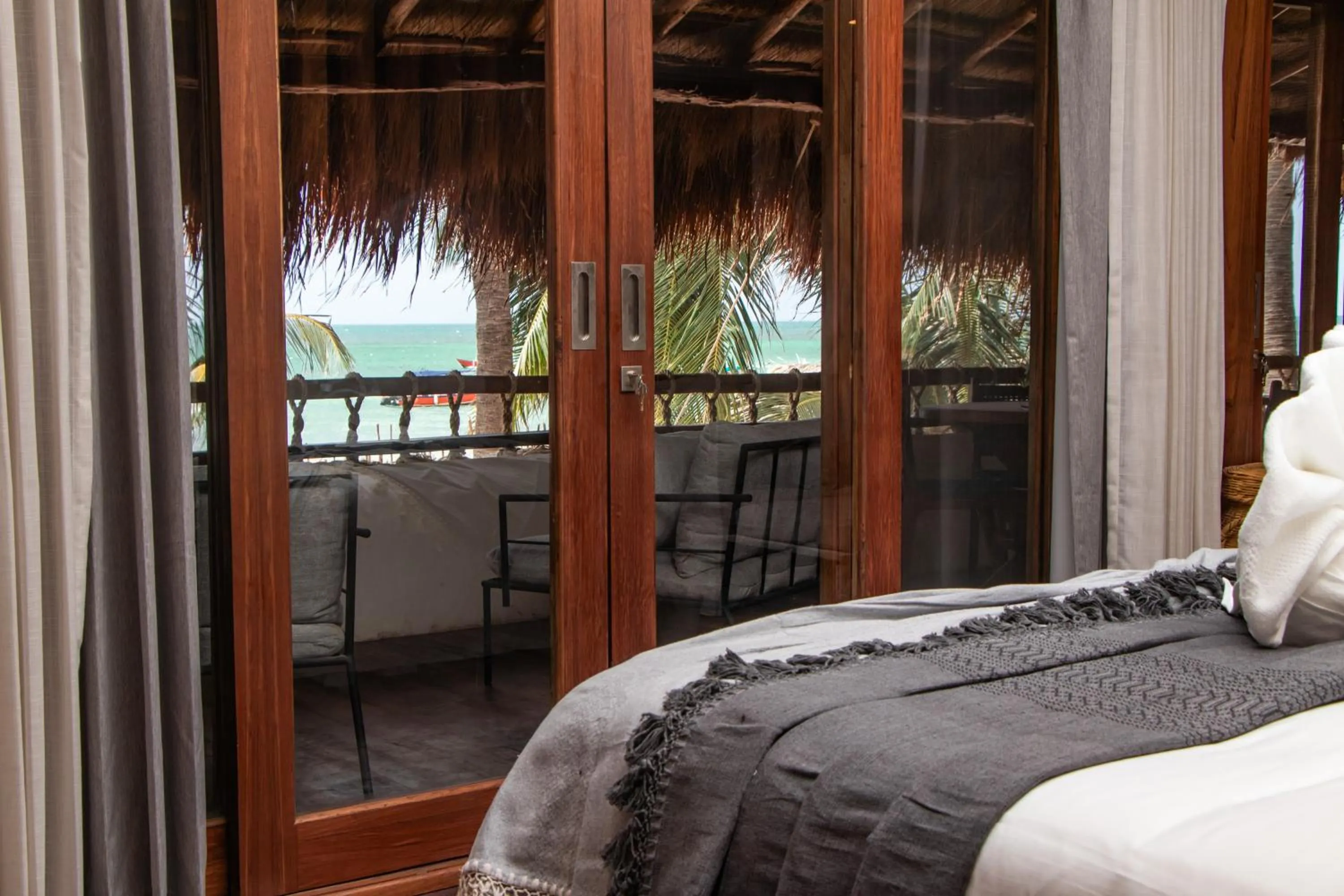 Bed in Amaite Holbox - Oceanfront Hotel