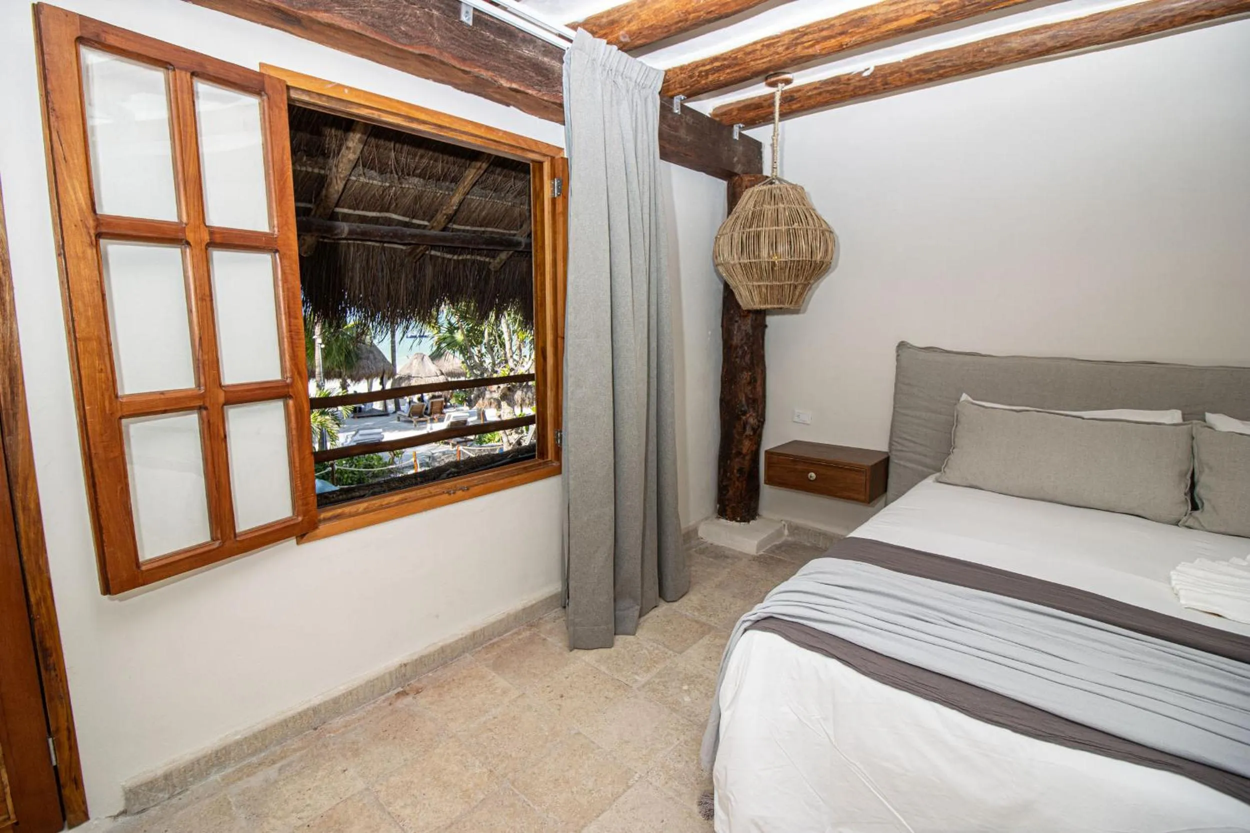 Bedroom, Bed in Amaite Holbox - Oceanfront Hotel