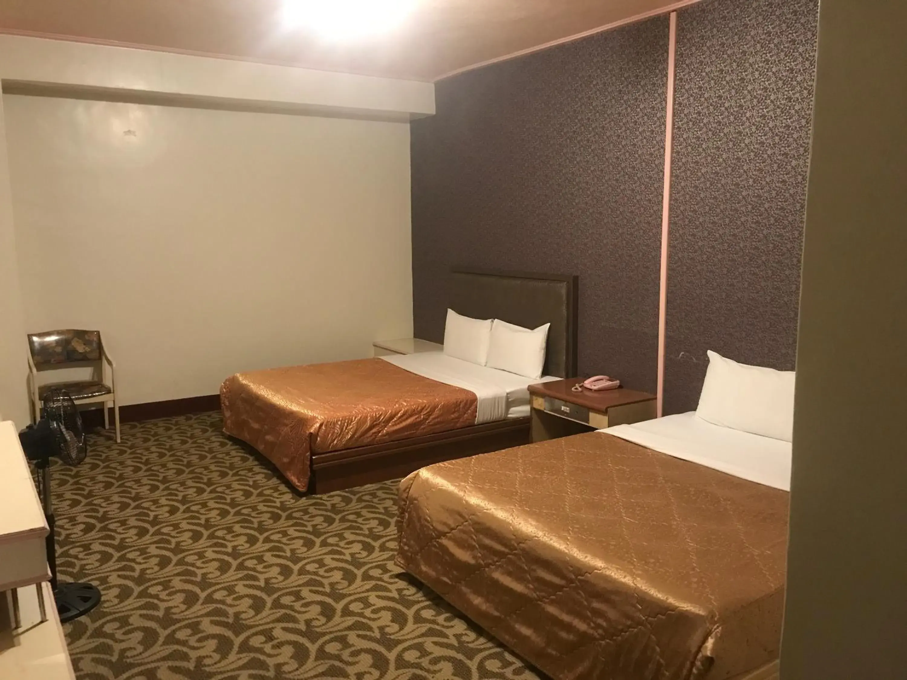 Quadruple Room with Private Bathroom in Teresa Hotel Quadruple Room with Private Bathroom in Teresa Hotel