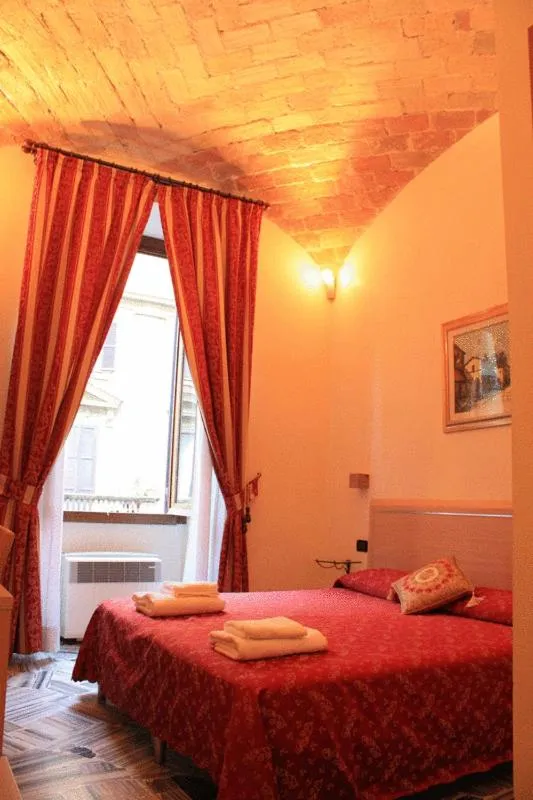 Bed in Hotel Campidoglio