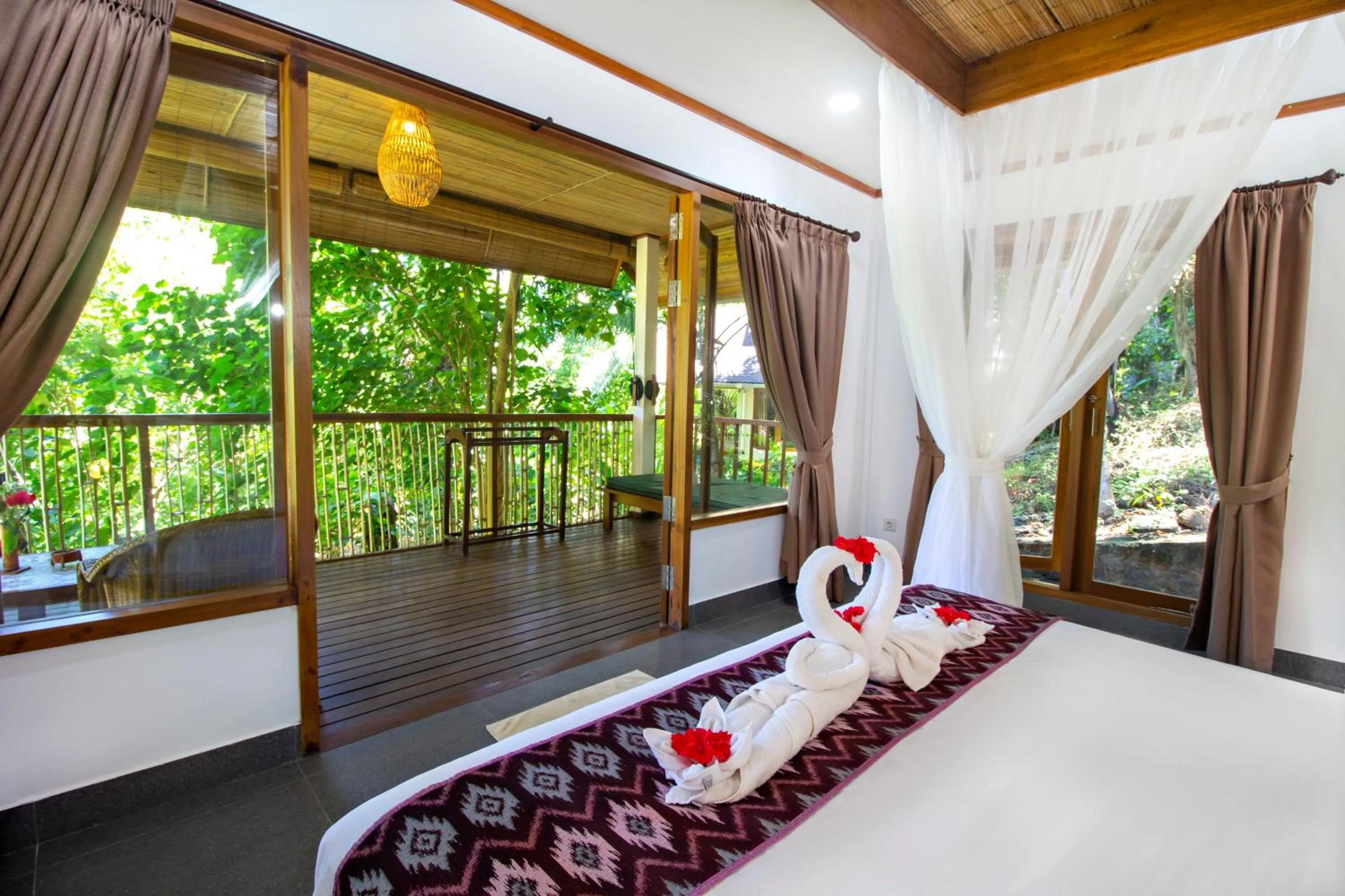 Balcony/Terrace, Bed in Murex Bangka Dive Resort
