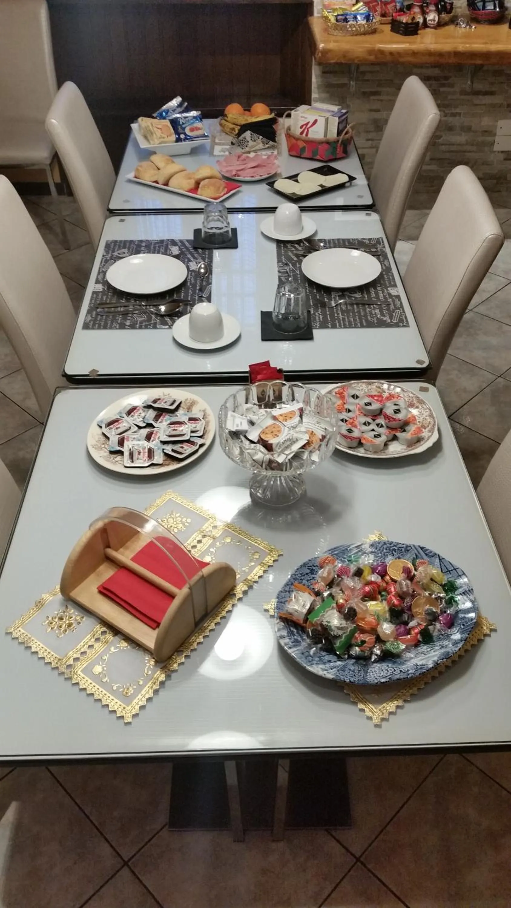 Communal lounge/ TV room in B&B Le Palme