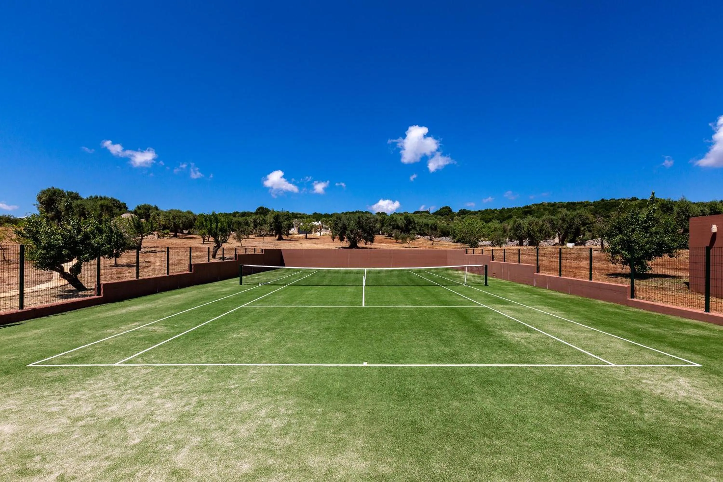 Tennis court in Le Ali Bianche by Perle di Puglia