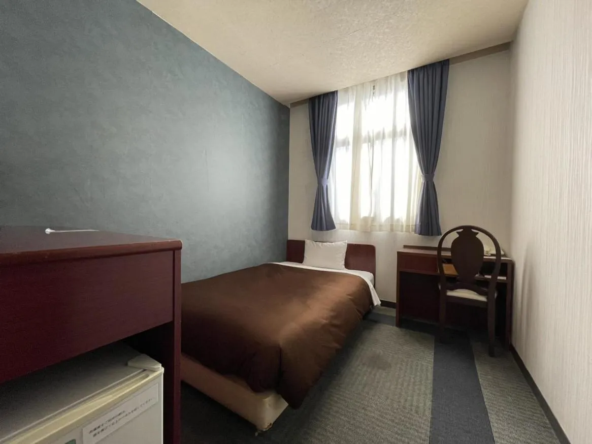 Photo of the whole room, Bed in Zentsuji Grand Hotel