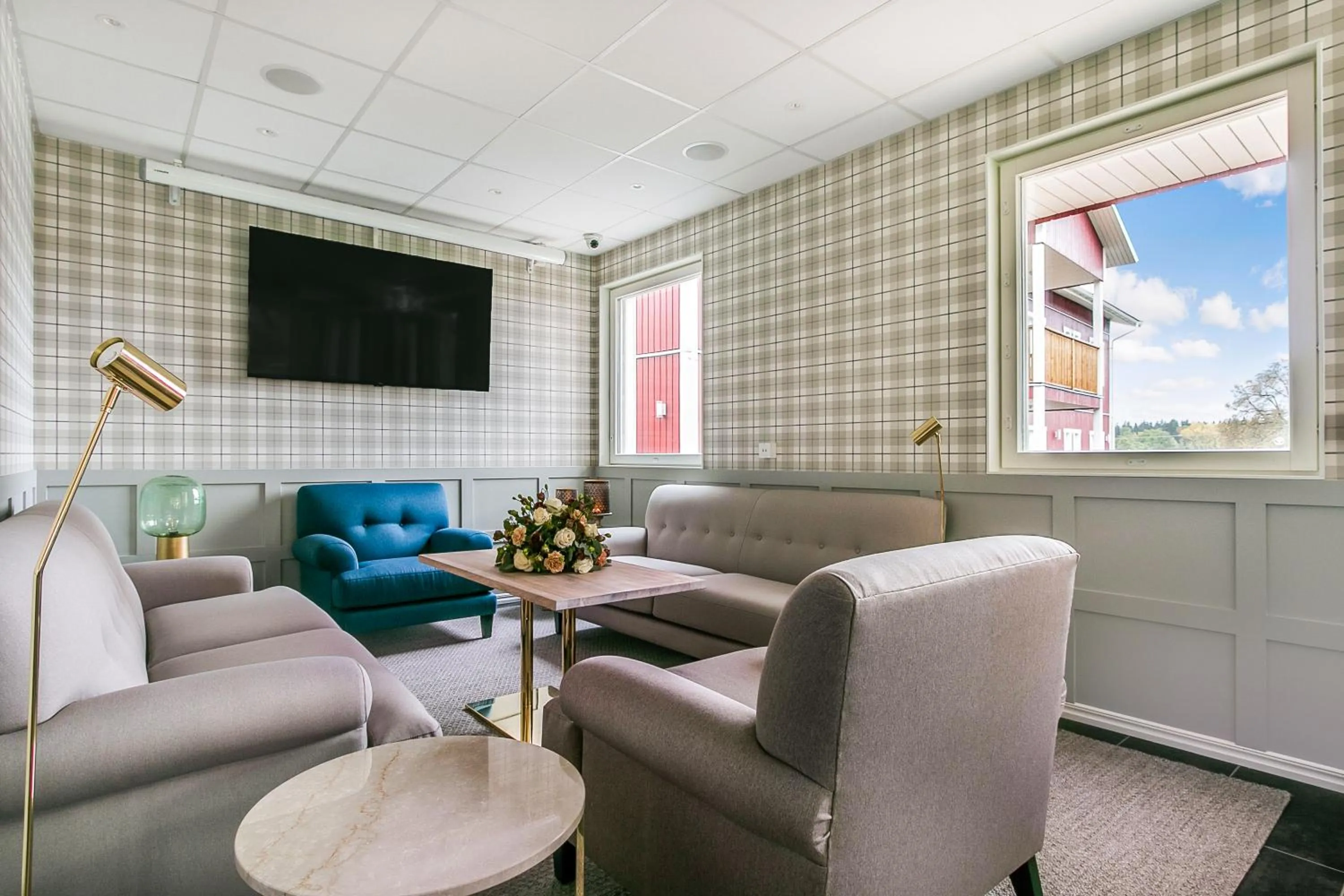 Communal lounge/ TV room in Turinge Hotel