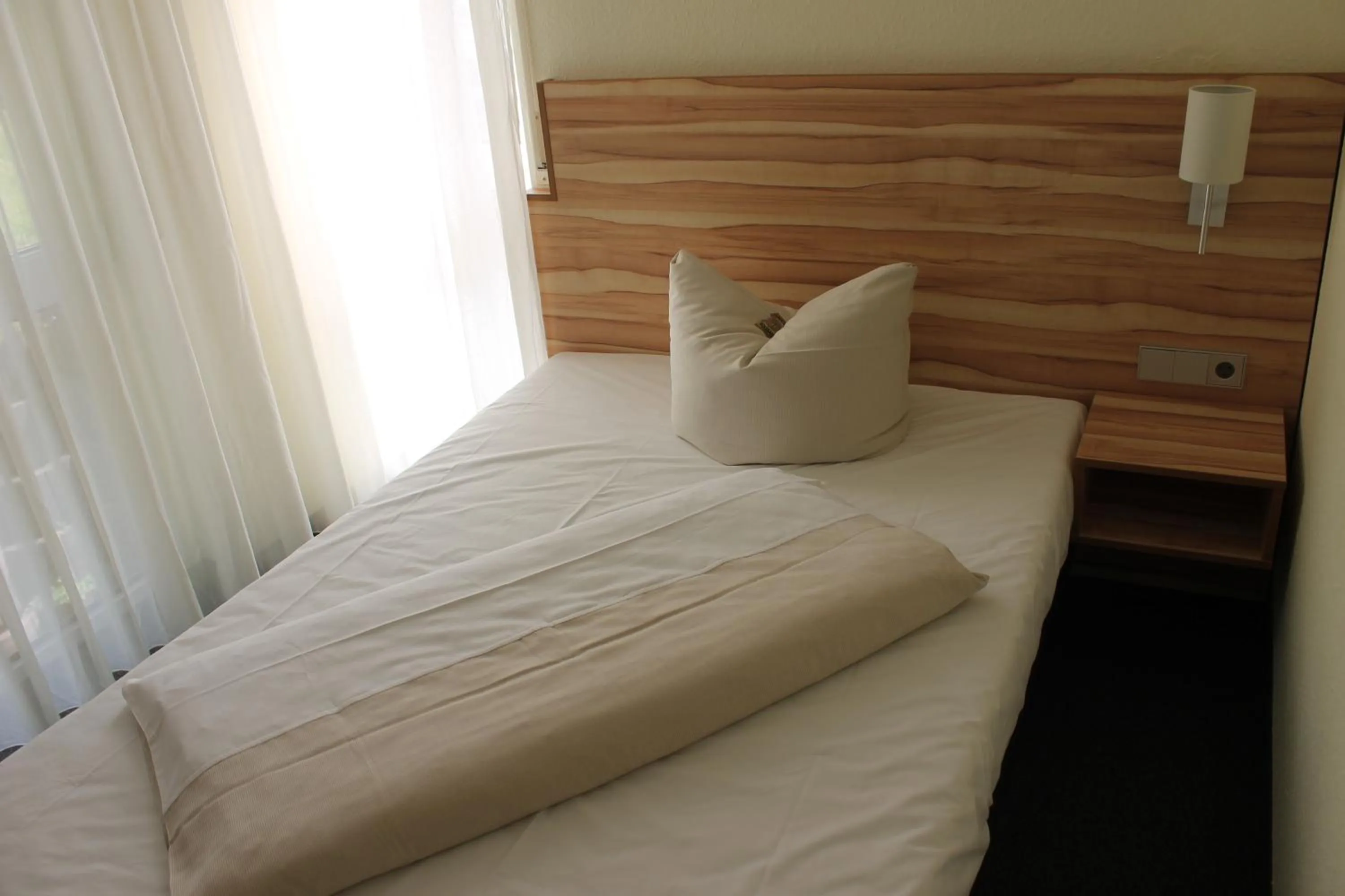 Bed in Hotel Weissach Am Neuenbühl