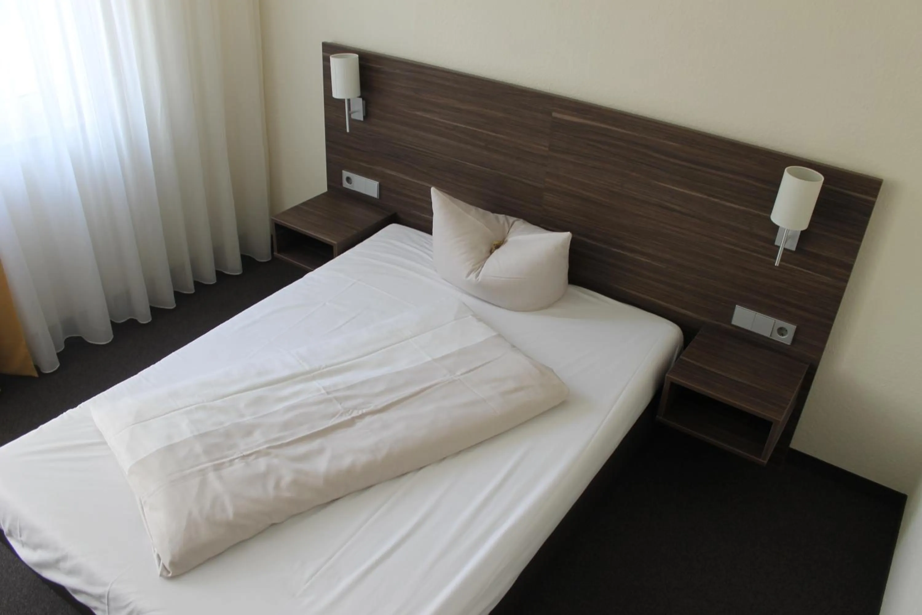 Bed in Hotel Weissach Am Neuenbühl