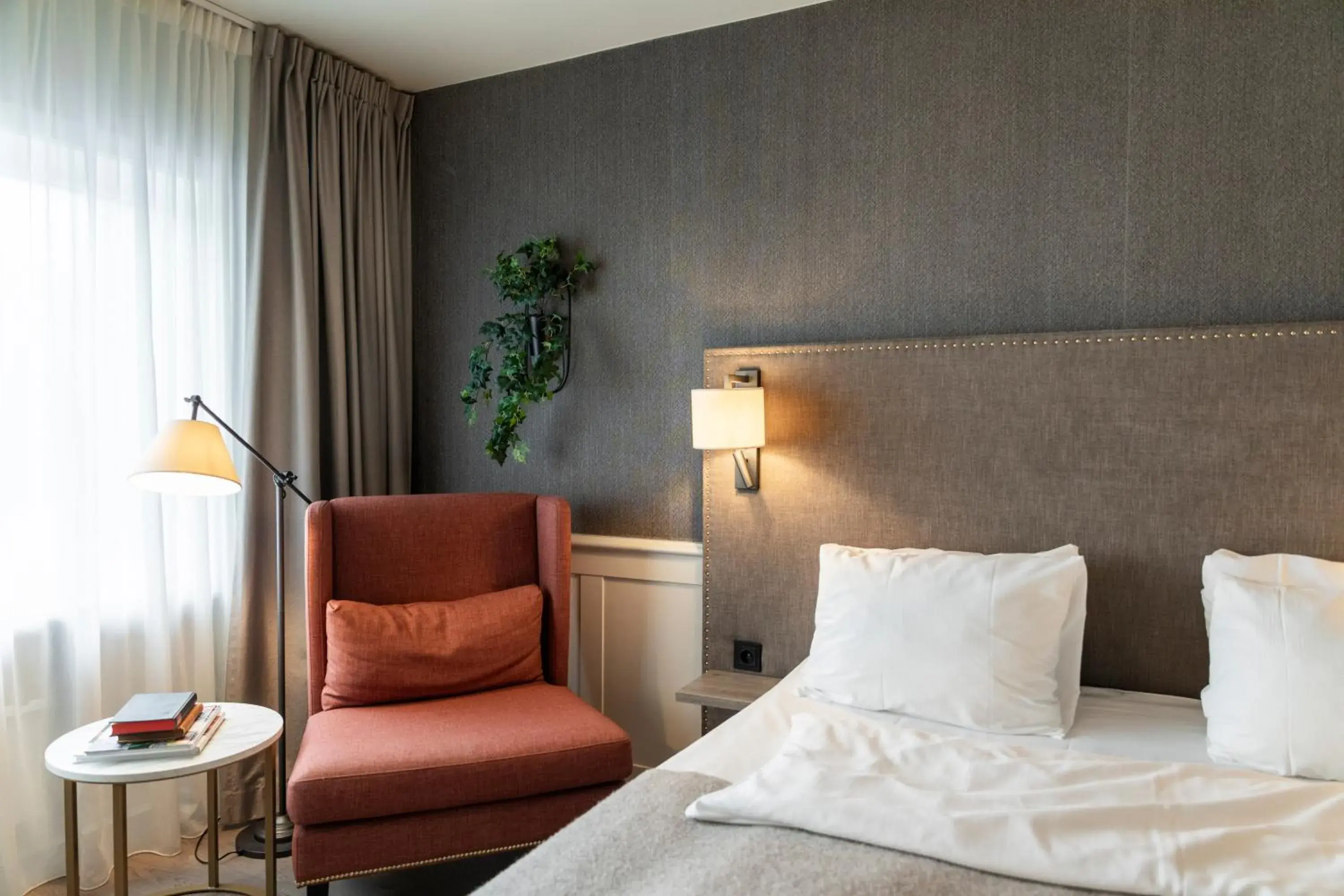 Seating area, Bed in Home Hotel Grand Bodø Seating area, Bed in Home Hotel Grand Bodø