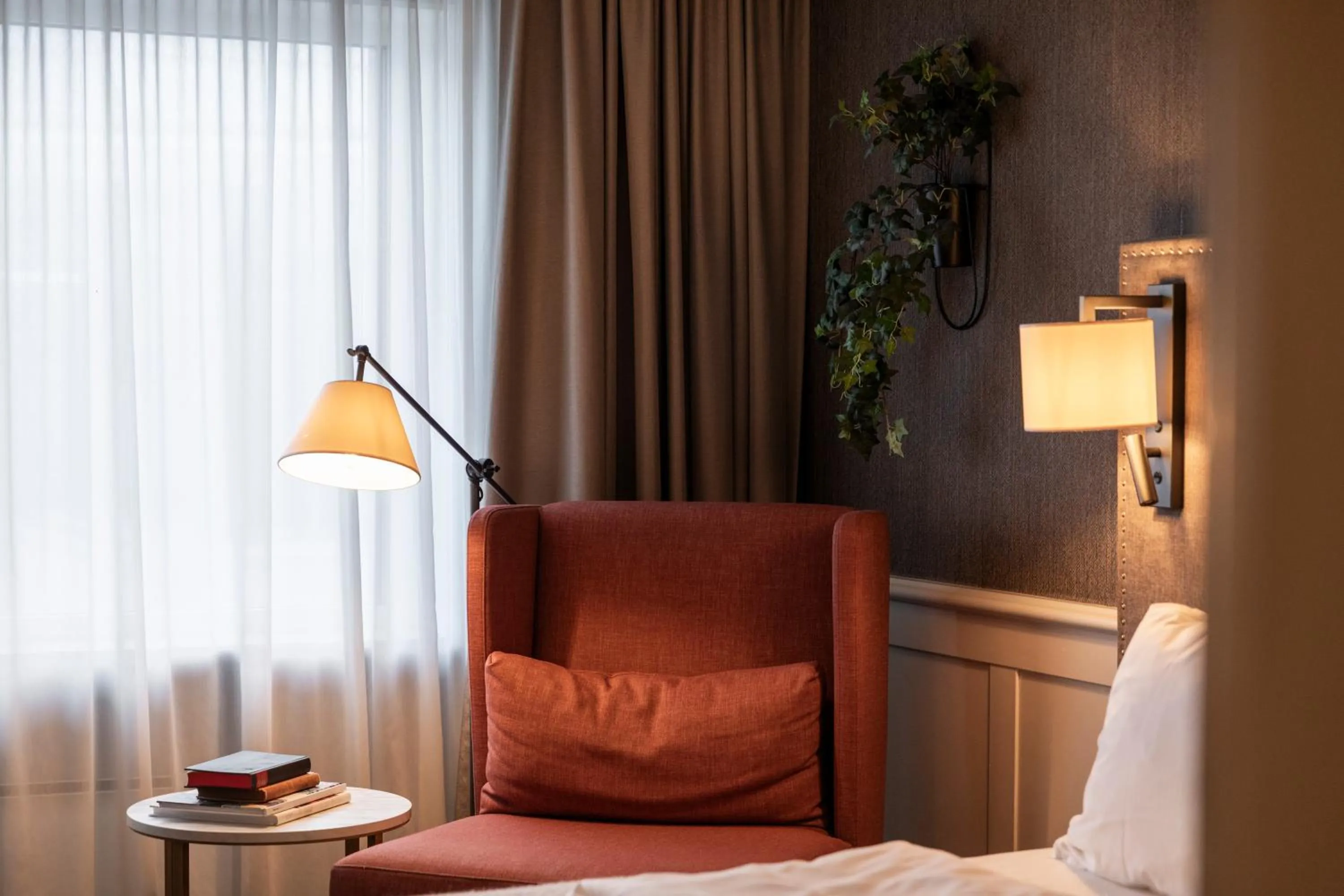 Seating area, Bed in Home Hotel Grand Bodø