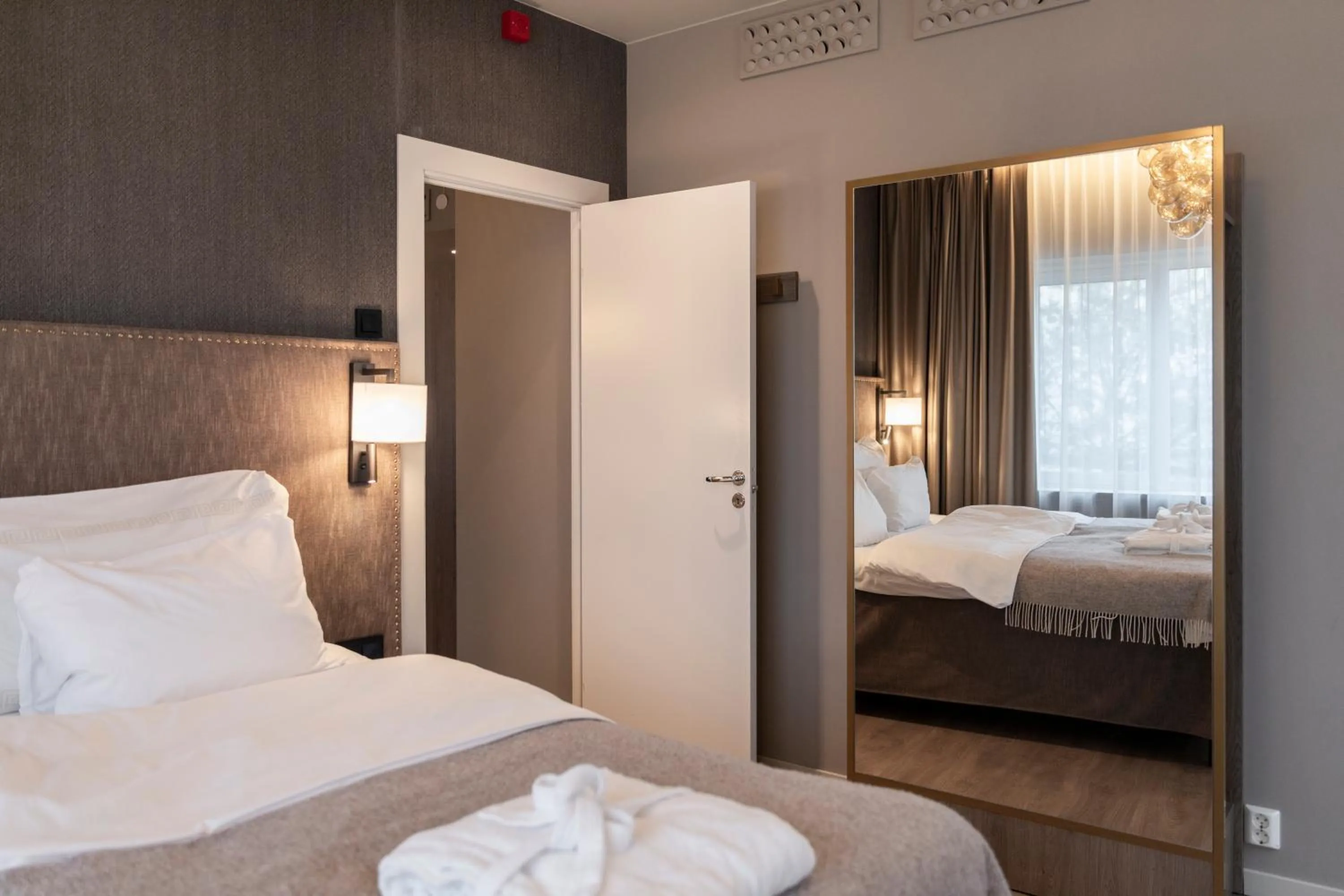 Bed in Home Hotel Grand Bodø