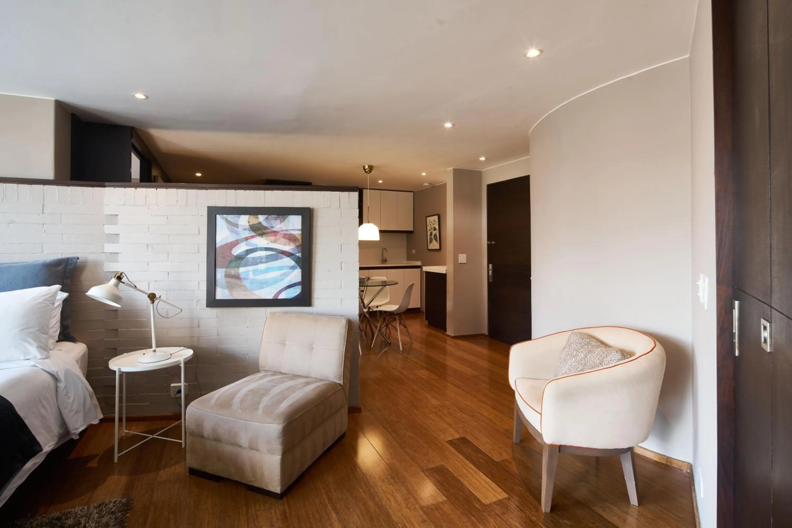 Bedroom in Nico Apartasuites