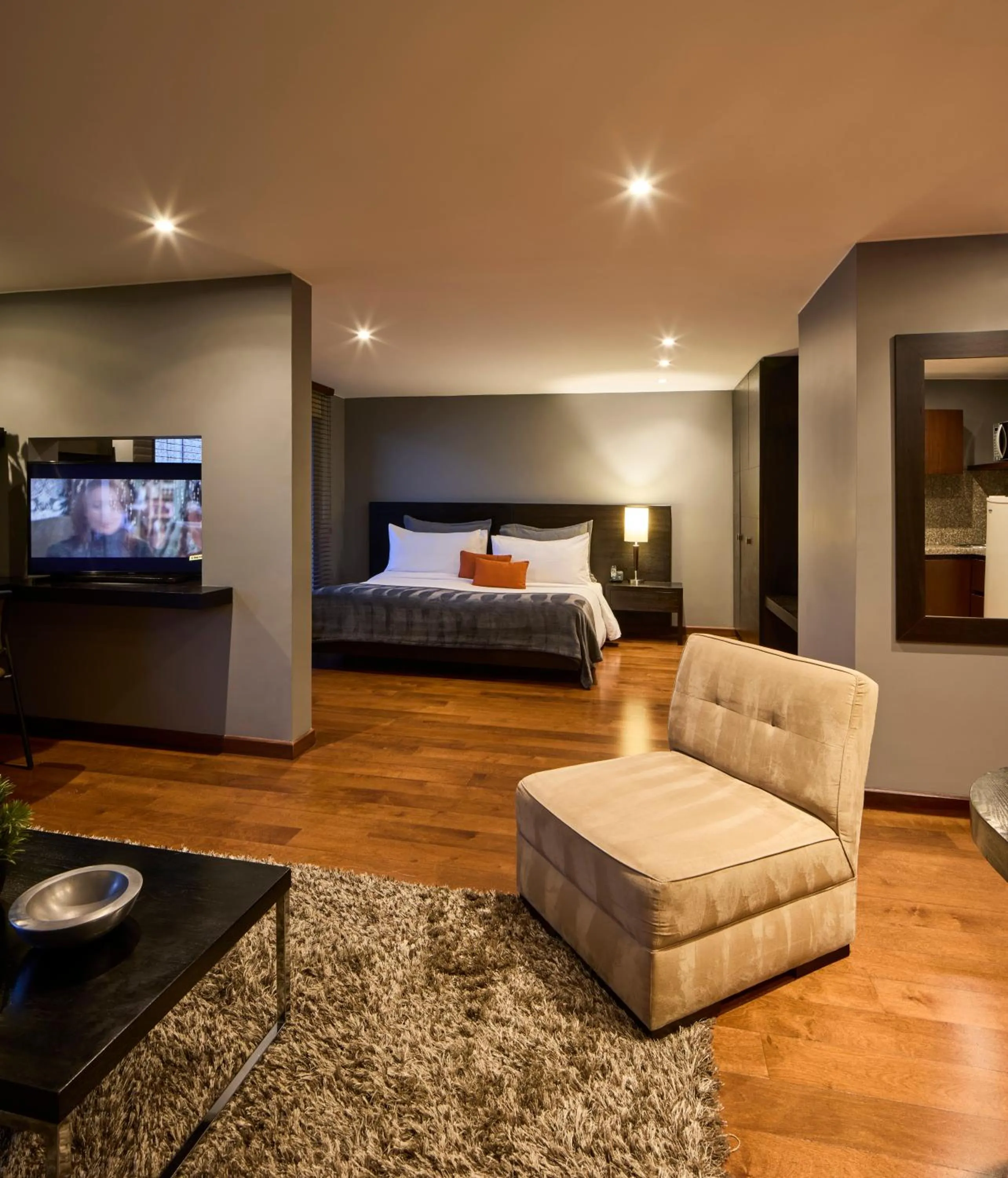 Bed in Nico Apartasuites