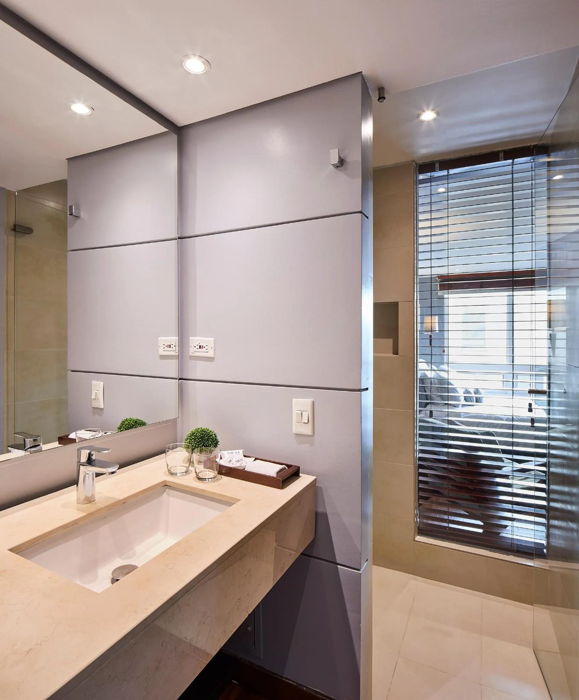 Bathroom in Nico Apartasuites