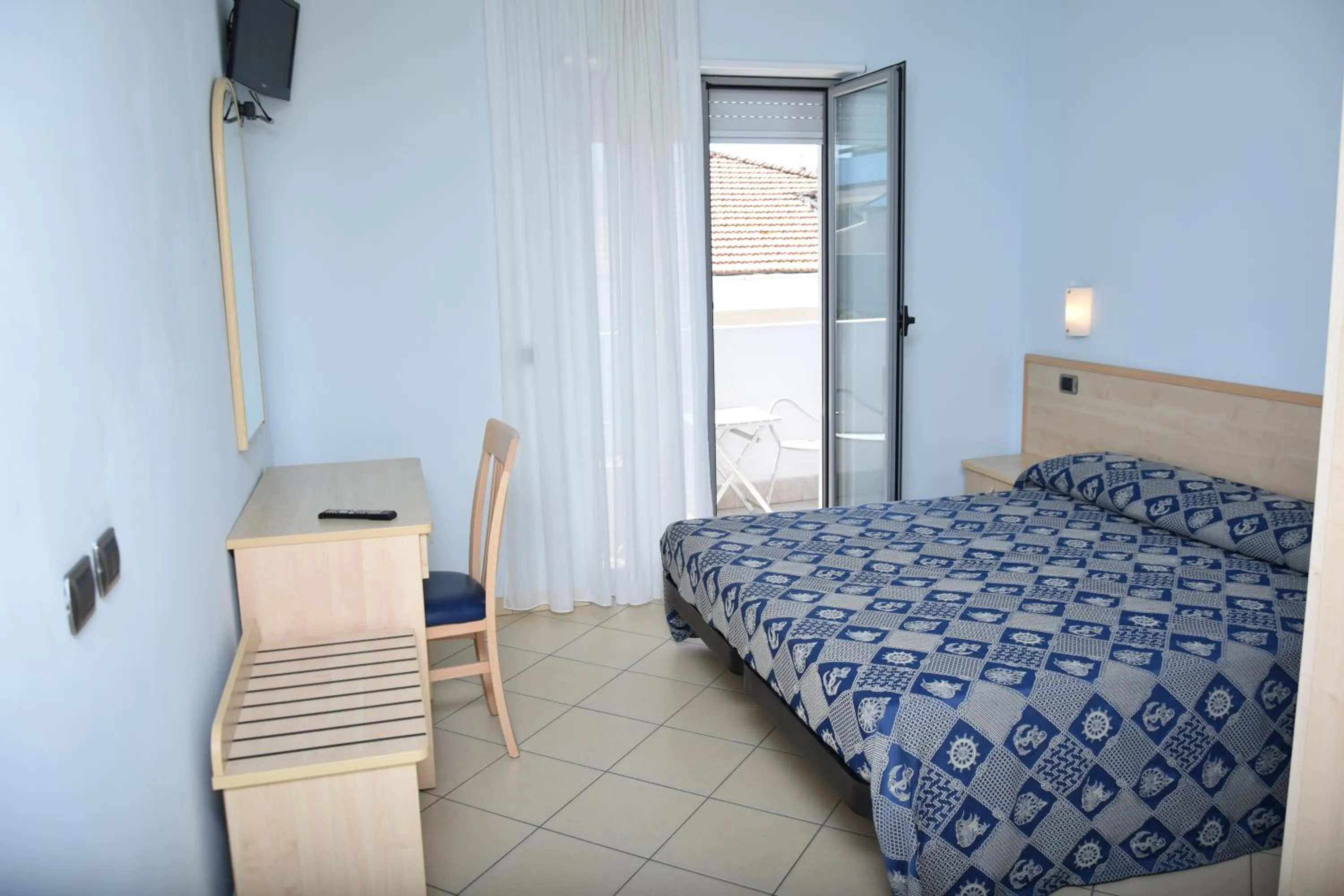 Bed in Hotel Antares