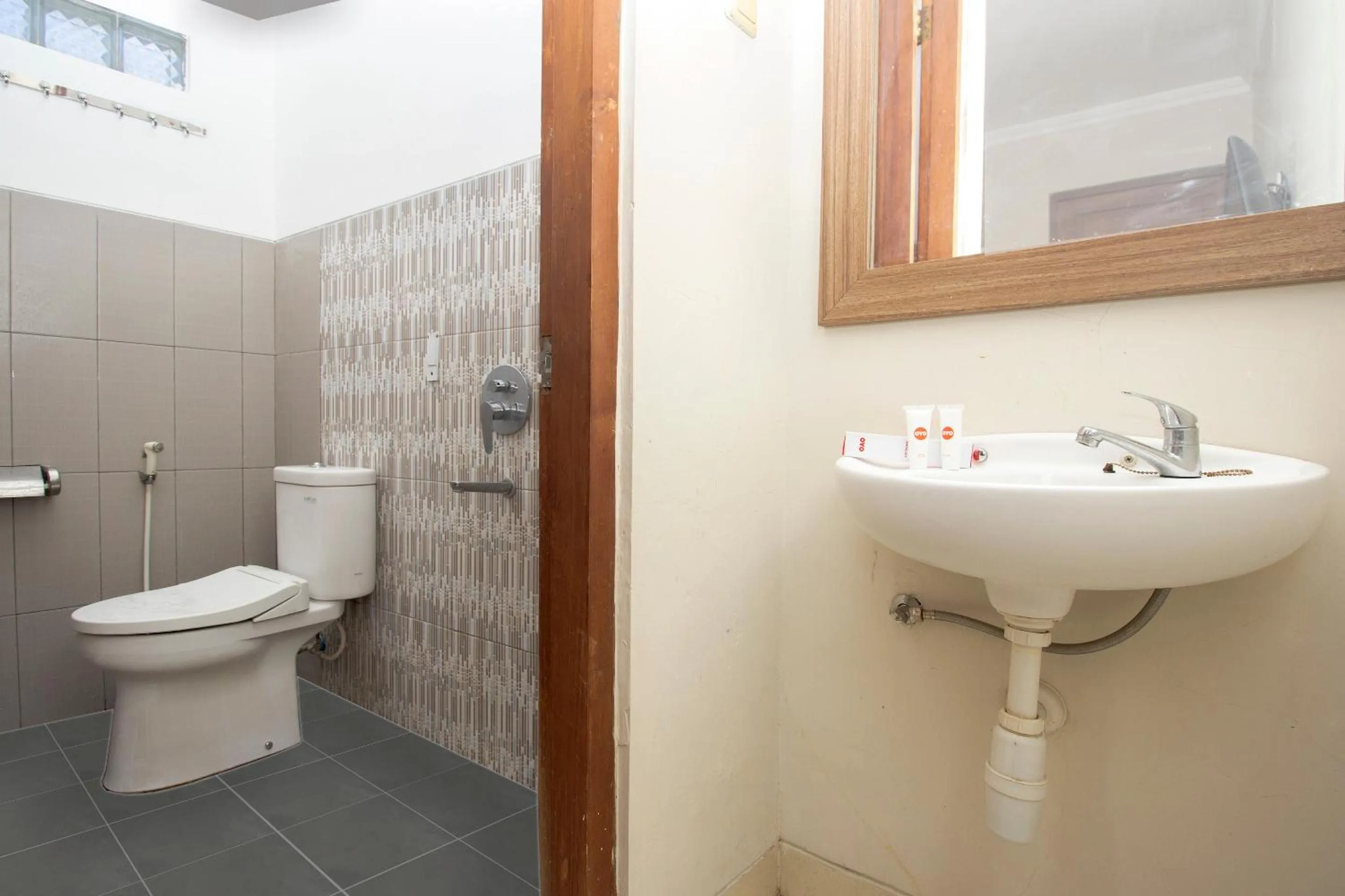 Bathroom in Collection O 1061 Aliya Homestay