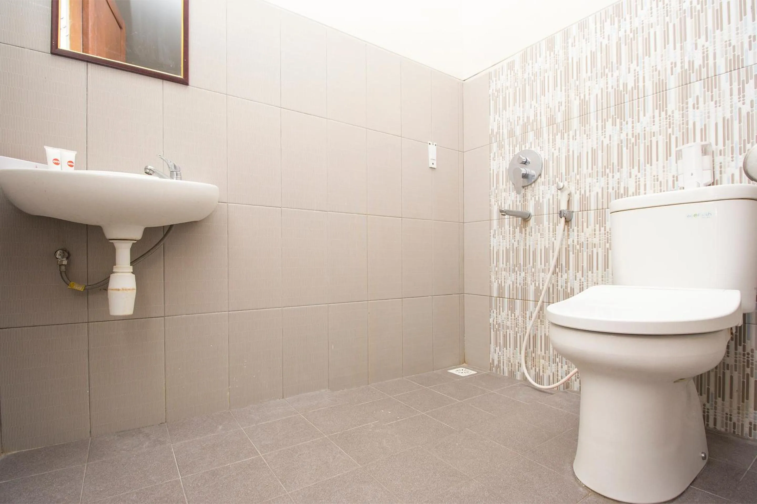 Bathroom in Collection O 1061 Aliya Homestay