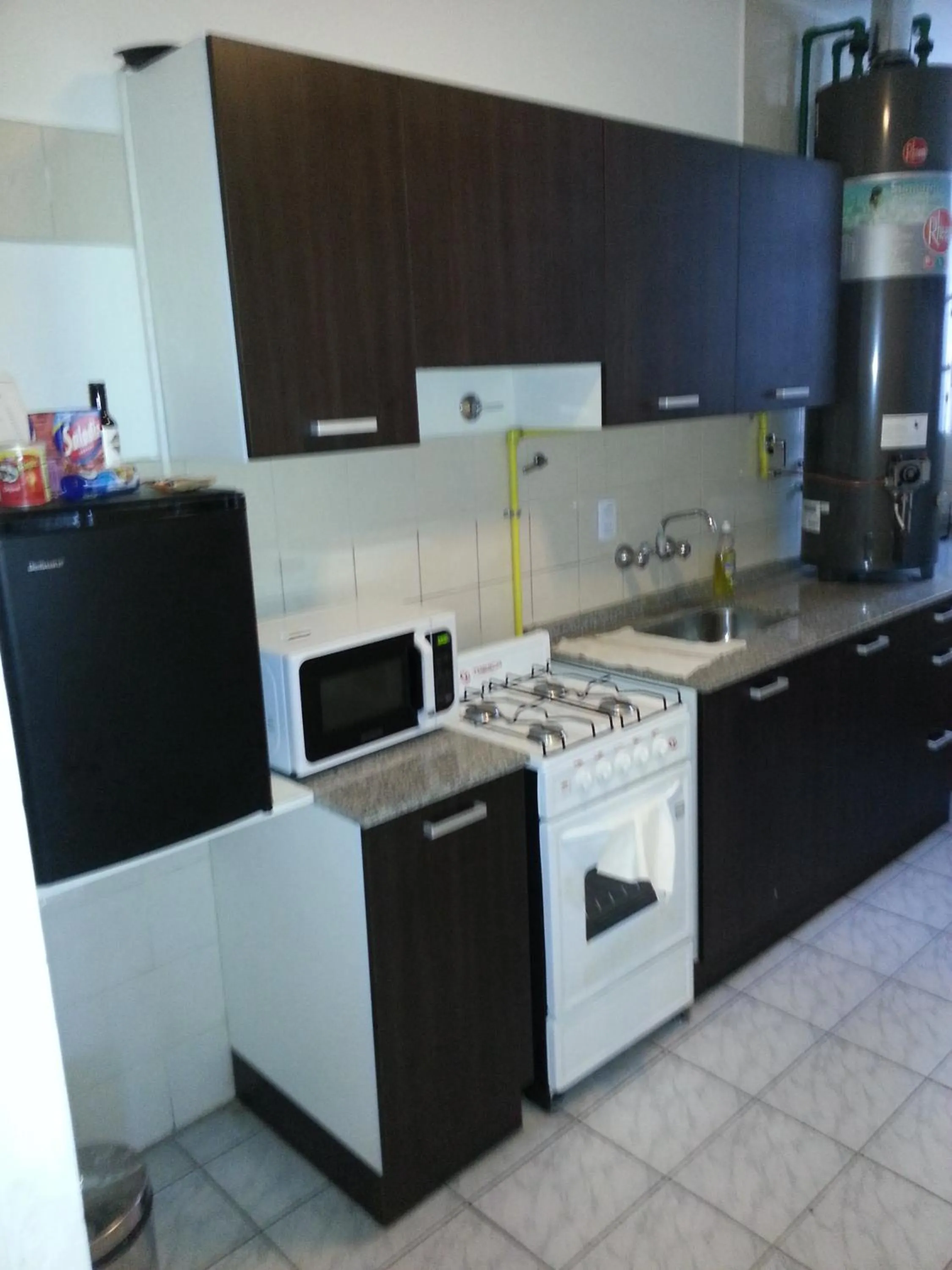 Kitchen or kitchenette in Villaggio Hotel Boutique