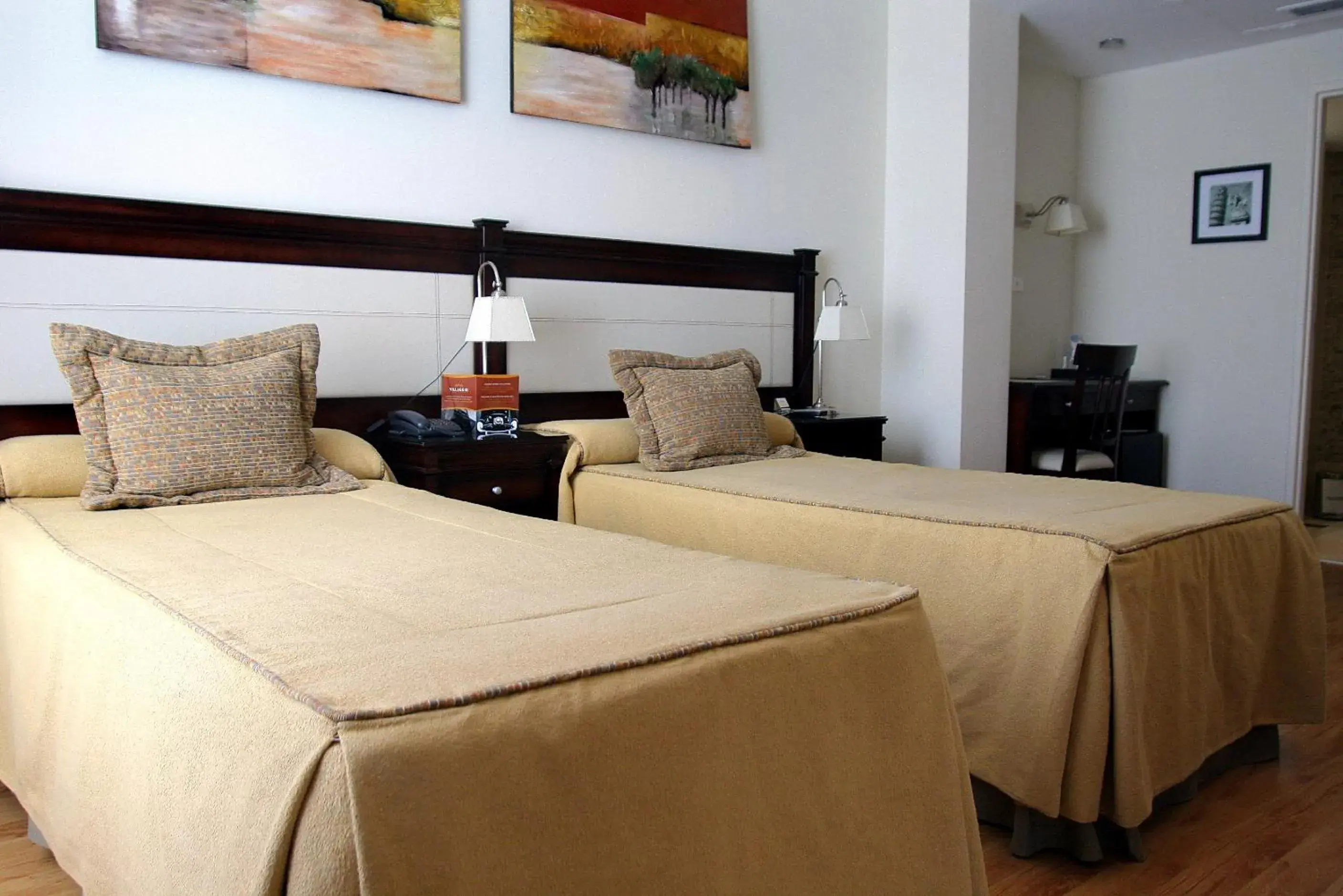 Bed in Villaggio Hotel Boutique Bed in Villaggio Hotel Boutique