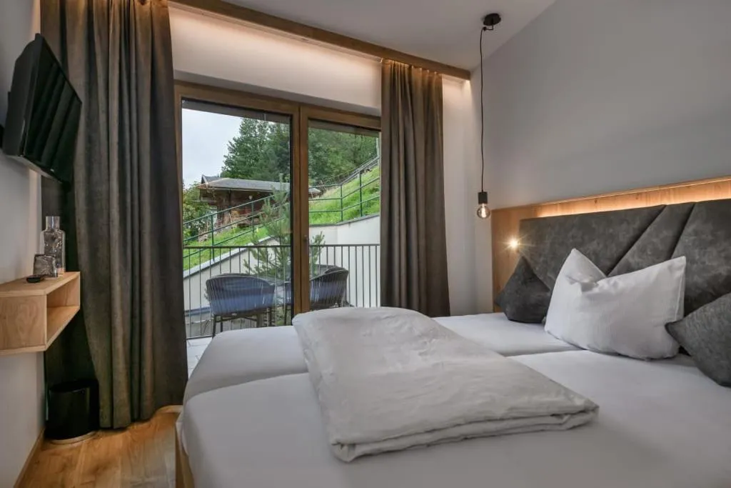 Bed in Hotel Hubertushof