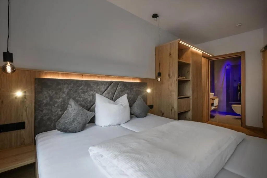 Bed in Hotel Hubertushof