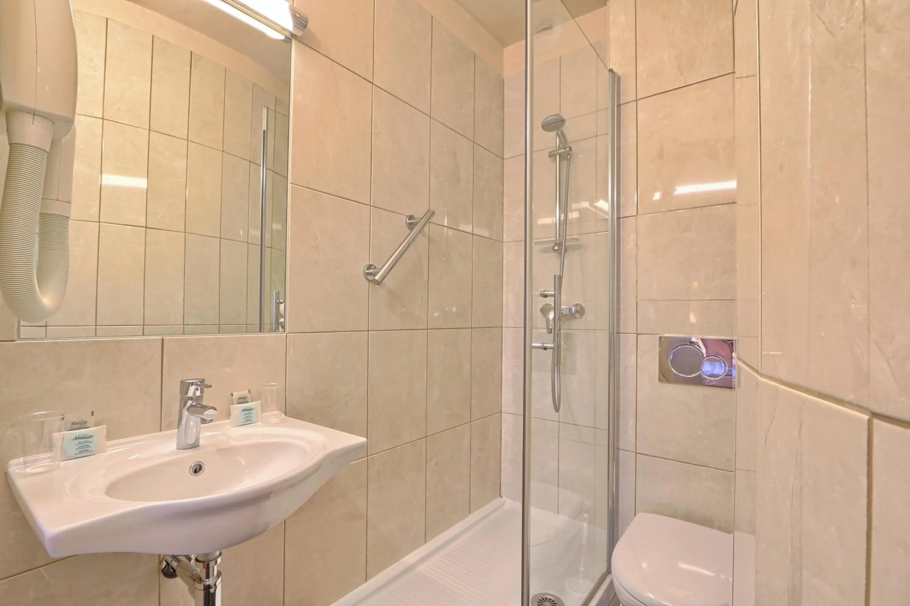 Toilet in Welcome Hotel