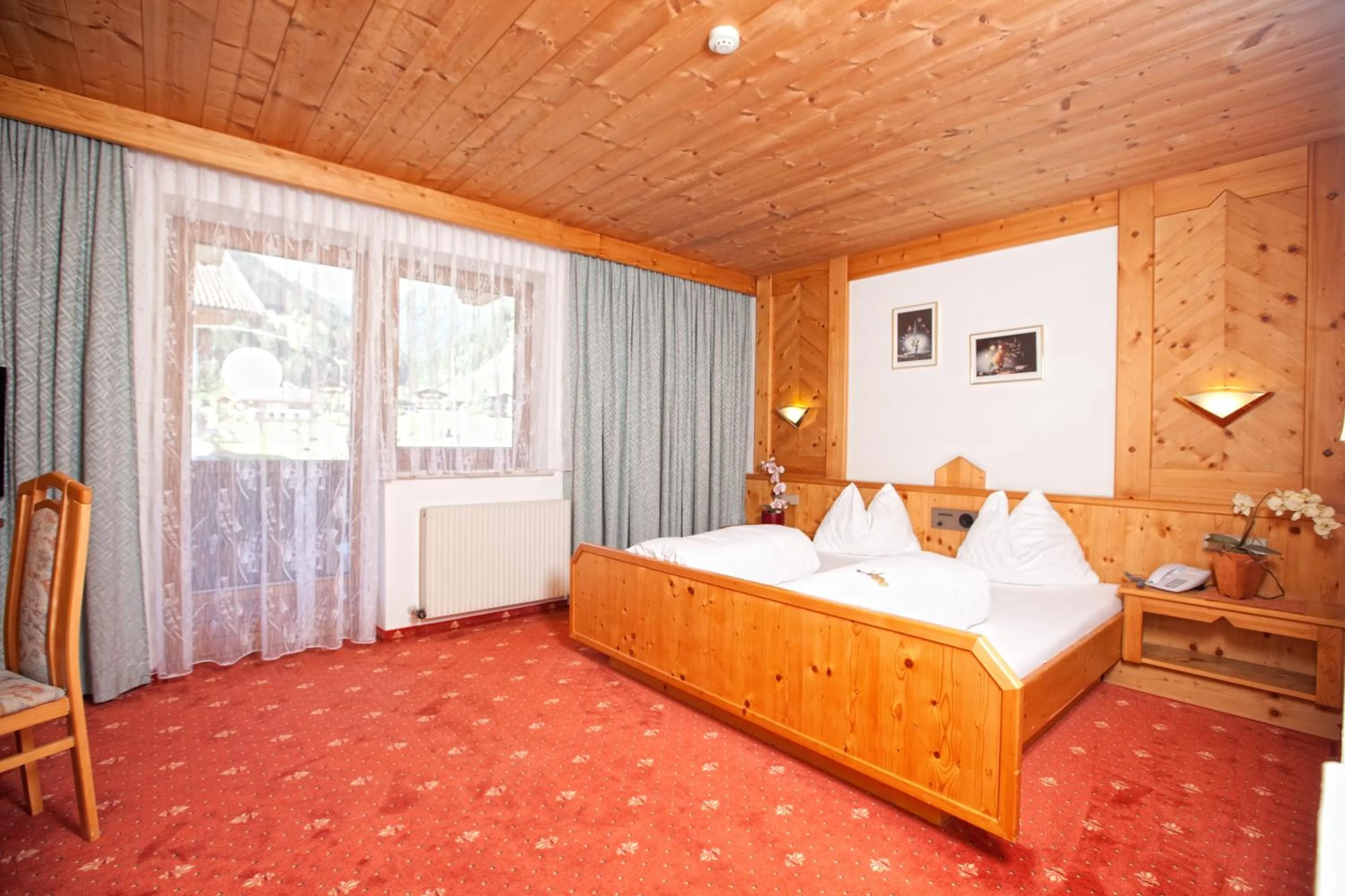 Bed in Appartementhaus zum Holzknecht am See