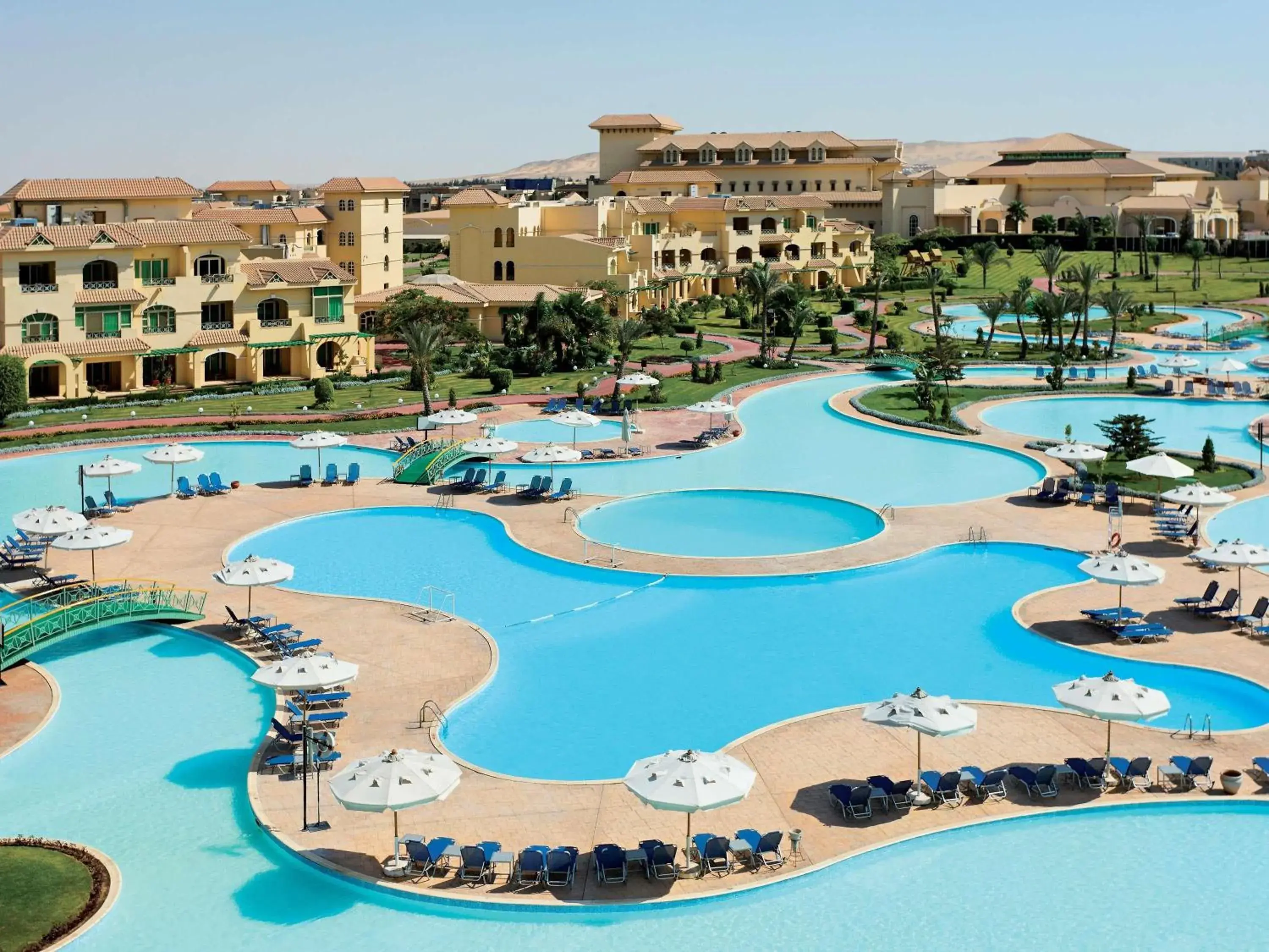 Pool view in Mövenpick Hotel Cairo - Media City Pool view in Mövenpick Hotel Cairo - Media City