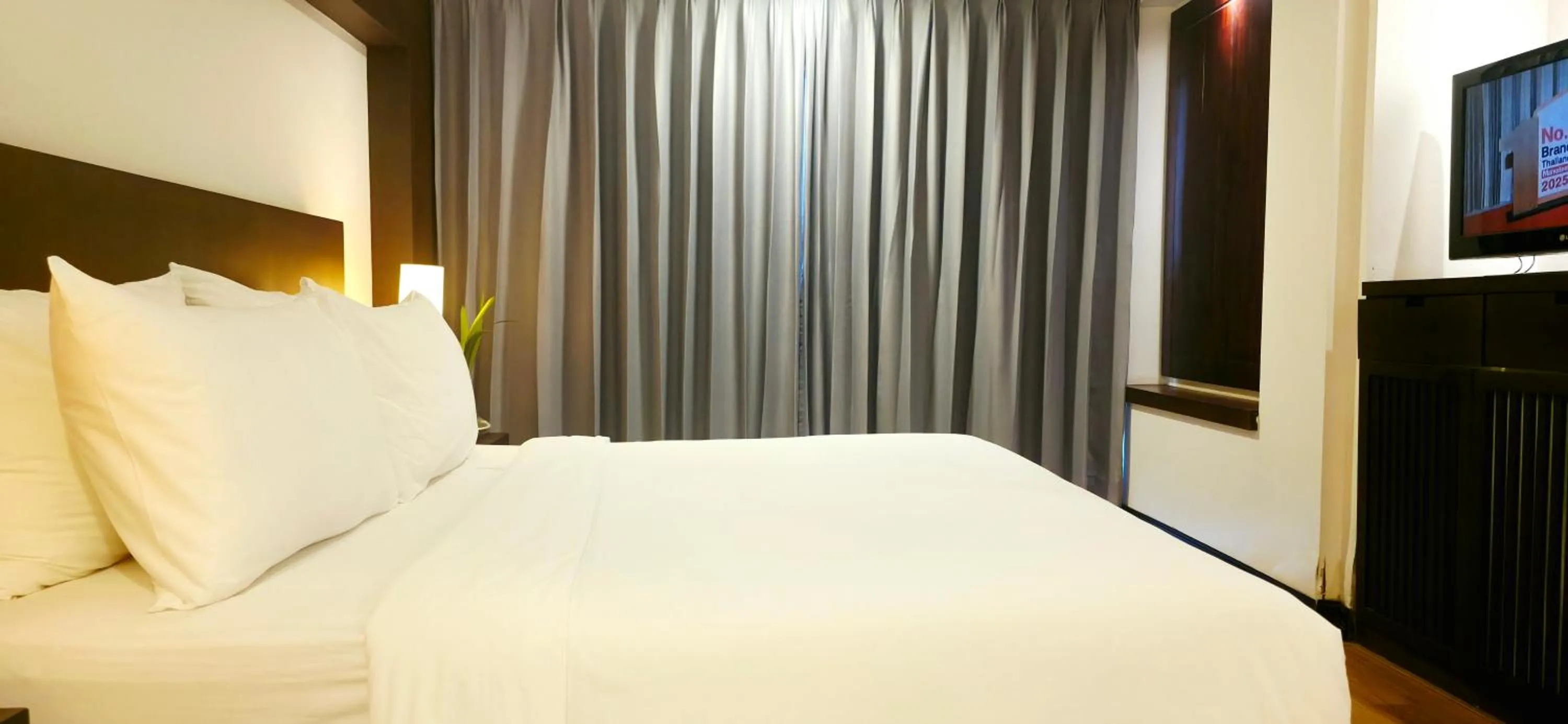 Bed in City Inn Vientiane