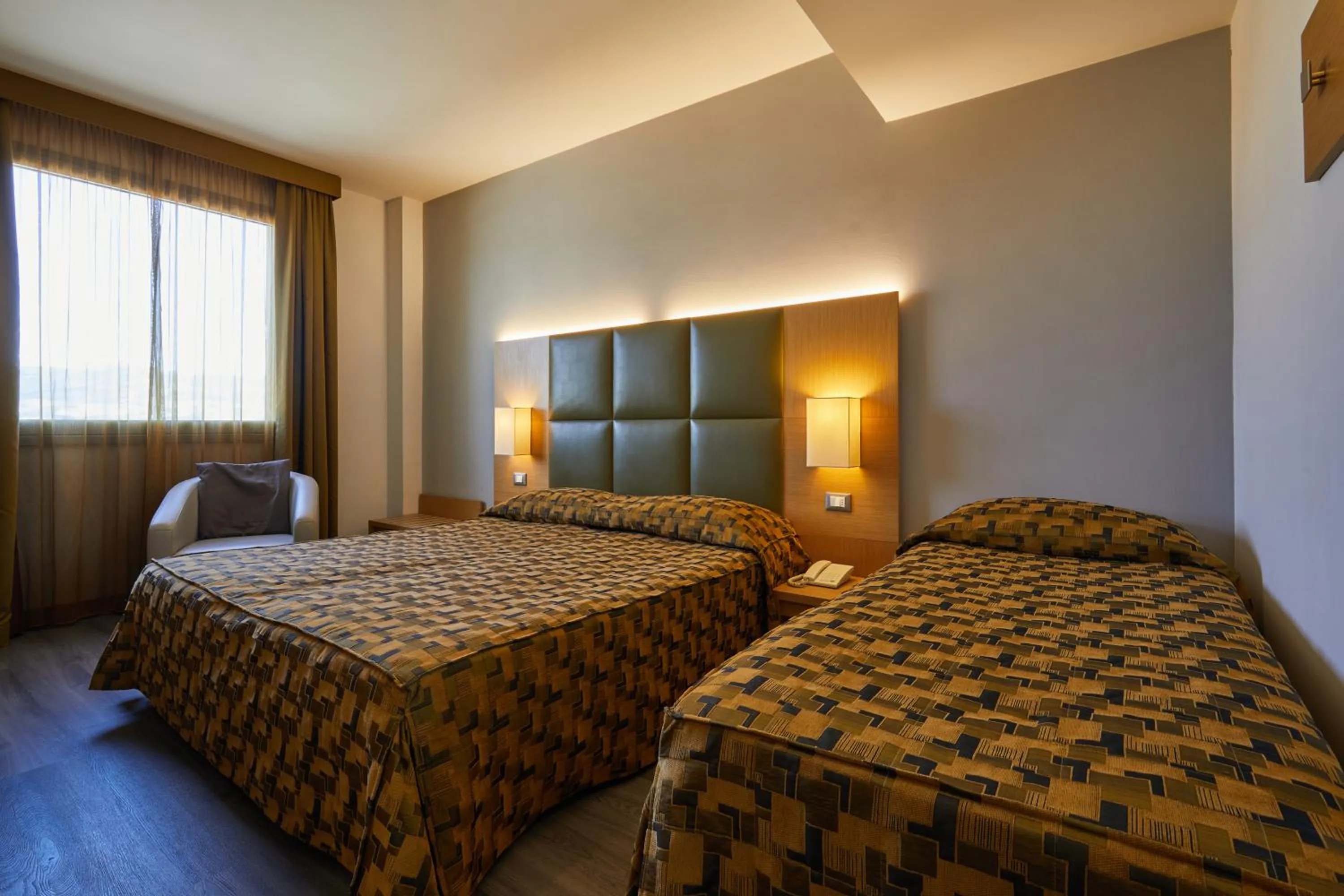 Bed in Castelmartini Wellness & Business Hotel