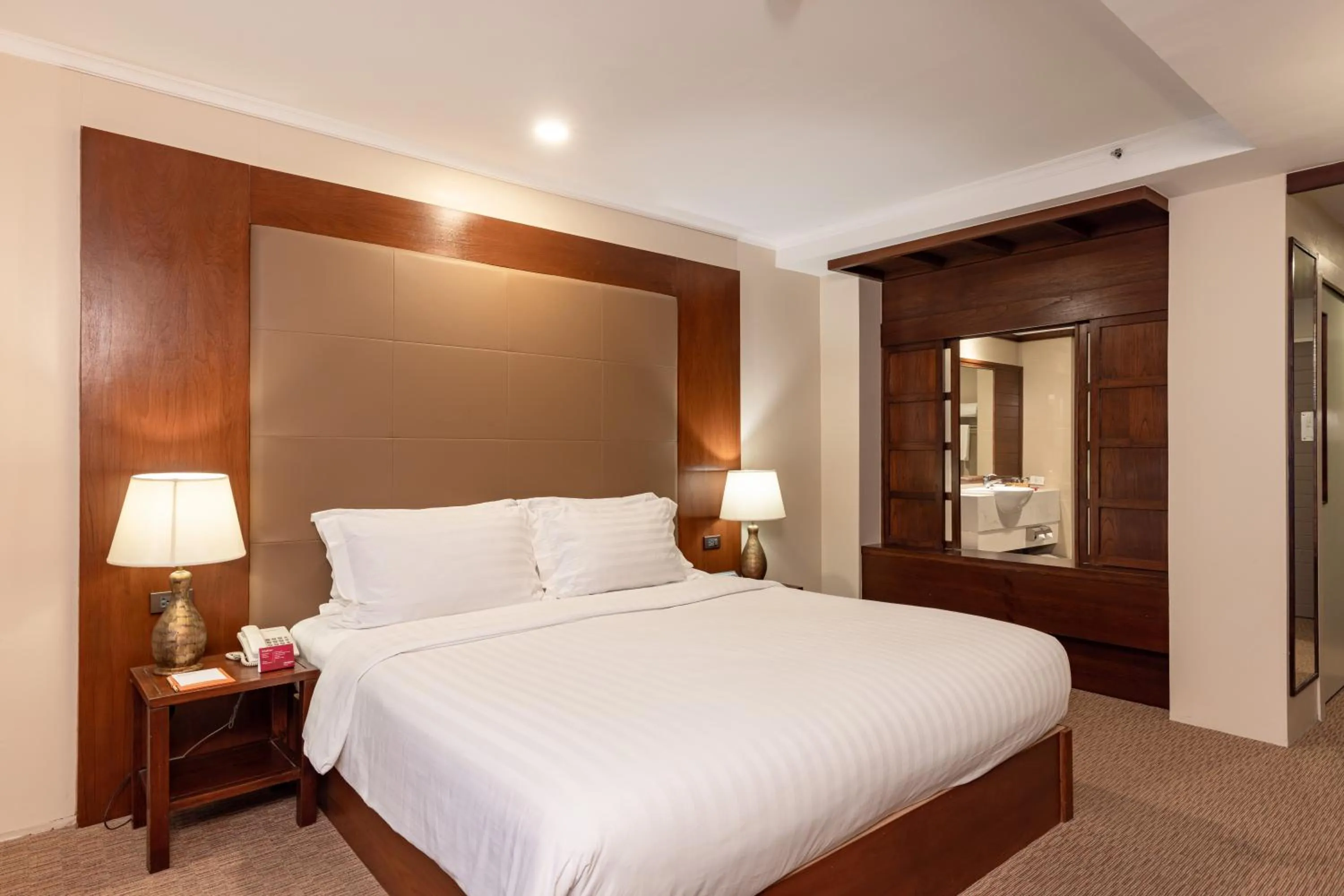 Bed in Movenpick Suriwongse Hotel Chiang Mai