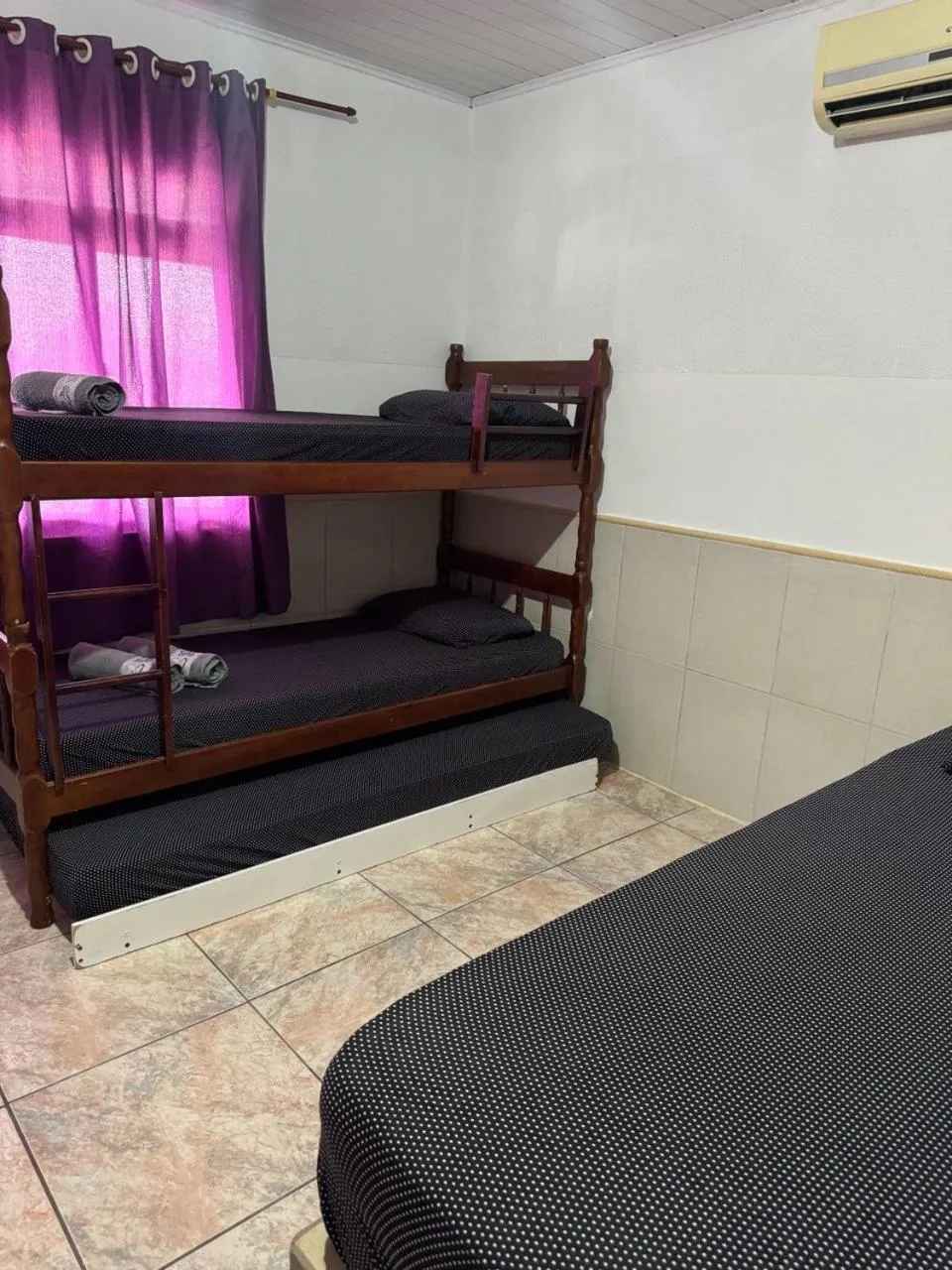 Bed in Pousada Tio Tonho