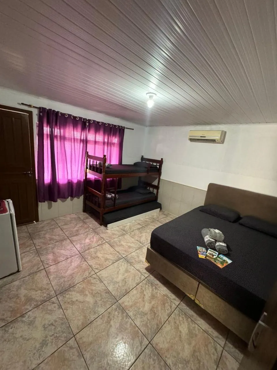 Bed in Pousada Tio Tonho