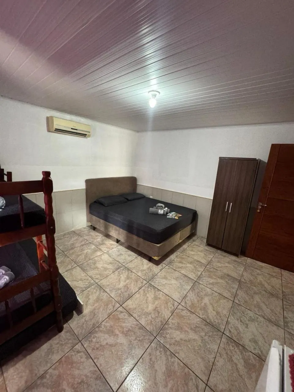 Bed in Pousada Tio Tonho