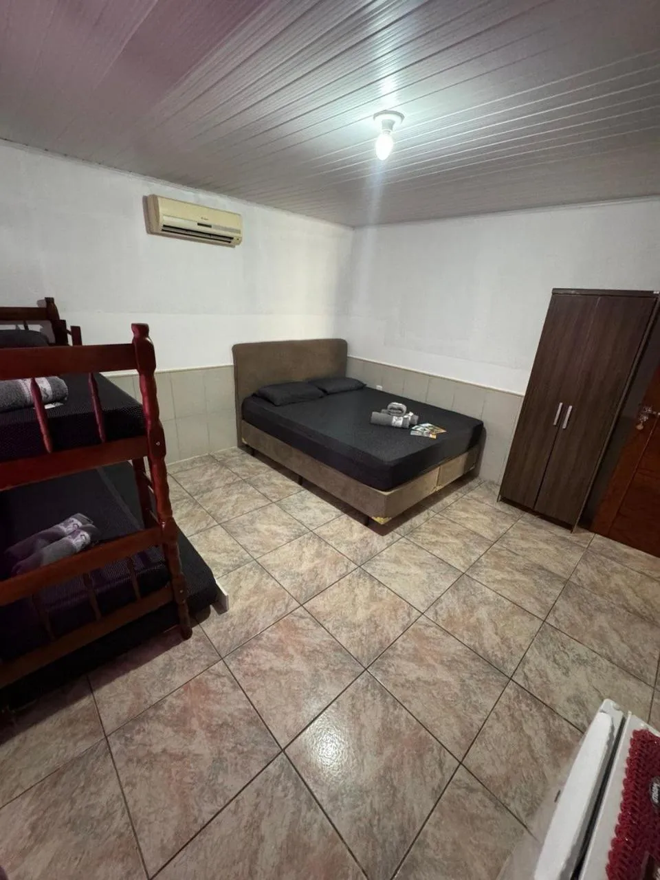 Bed in Pousada Tio Tonho