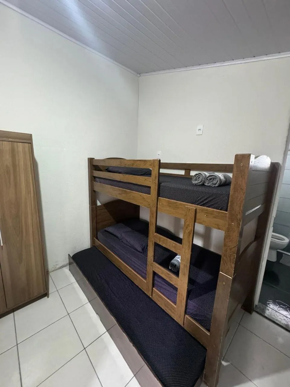 Bed in Pousada Tio Tonho