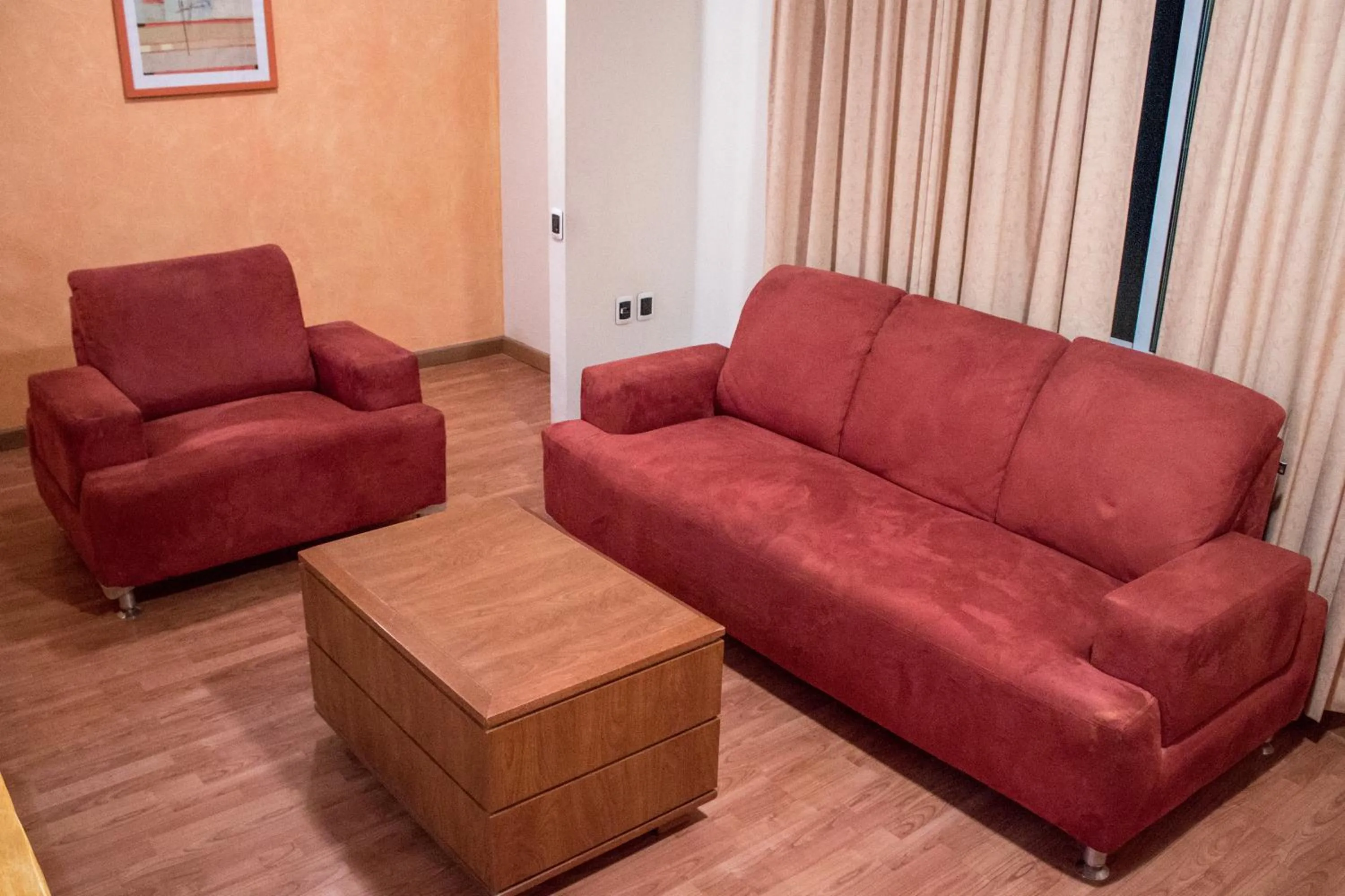 Living room in Autohotel Ilussion