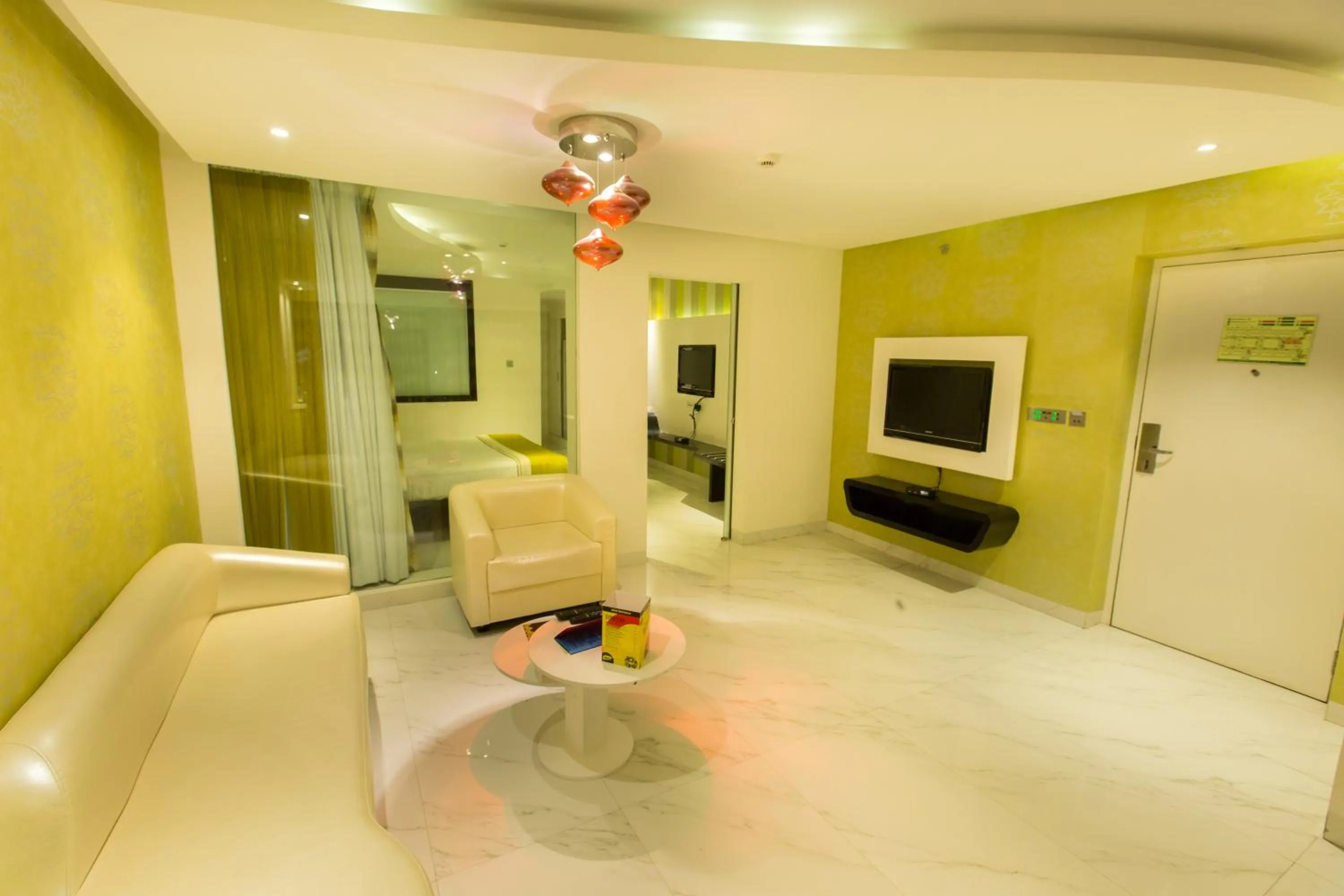 Communal lounge/ TV room in M Inn