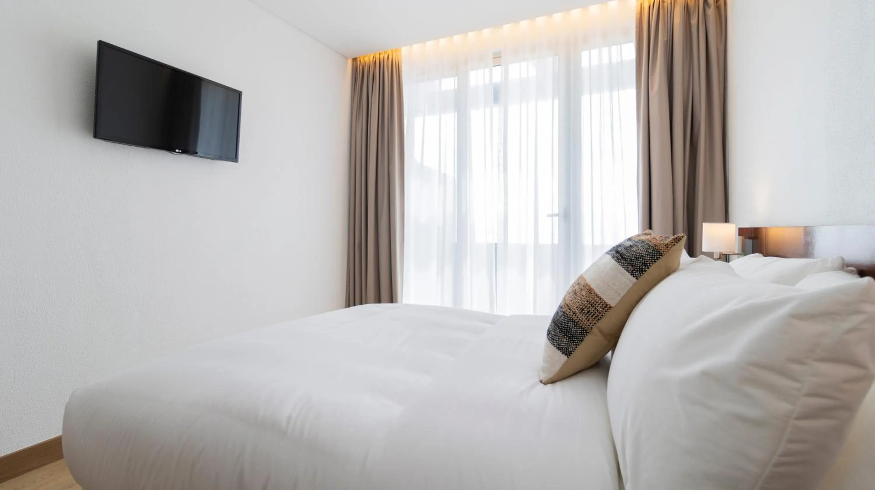 Bed in Albergaria Quim Barreiros