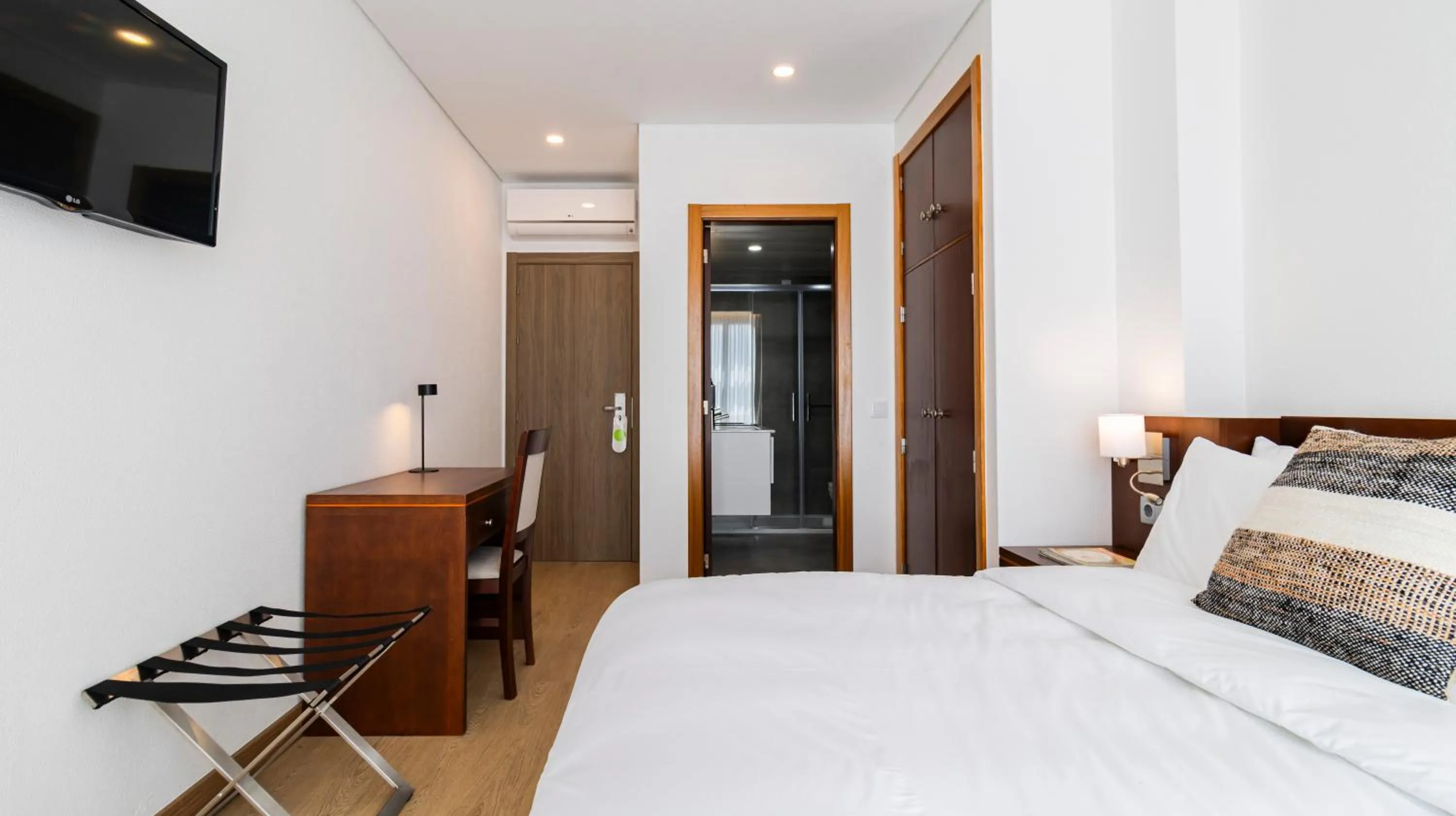 Bed in Albergaria Quim Barreiros