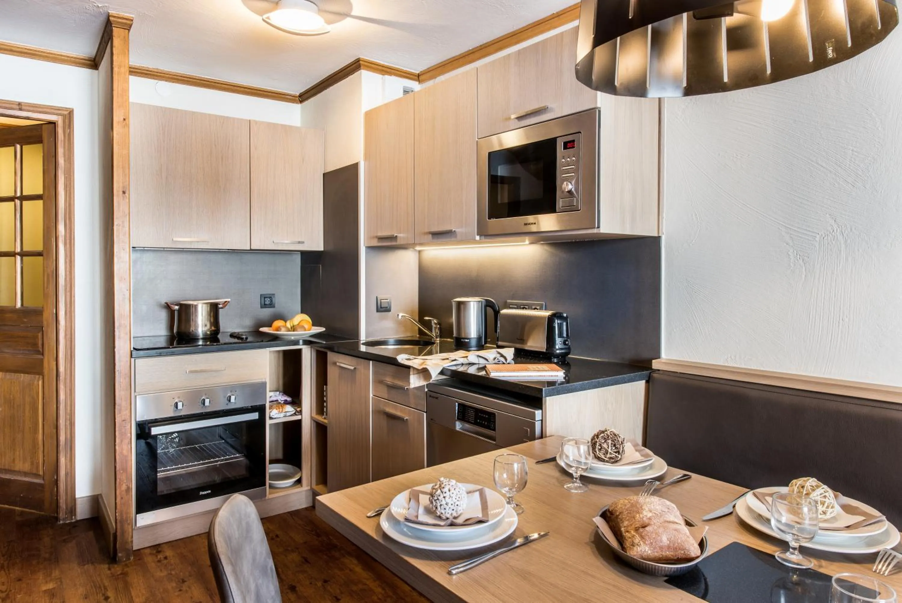 Kitchen or kitchenette in Résidences Village Montana by Village Montana