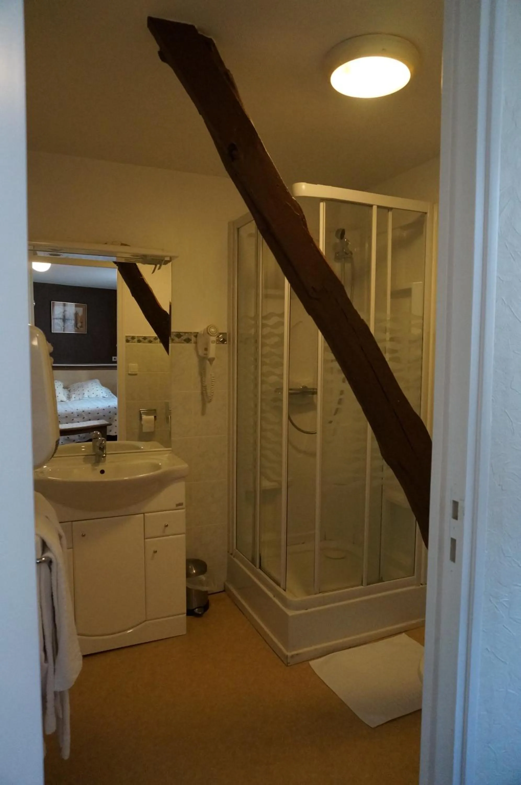 Bathroom in Logis Hôtel Teyssier