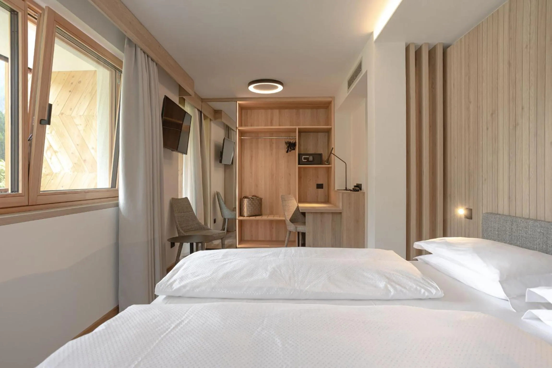 Sauna, Bed in Wellness Hotel Dolomia
