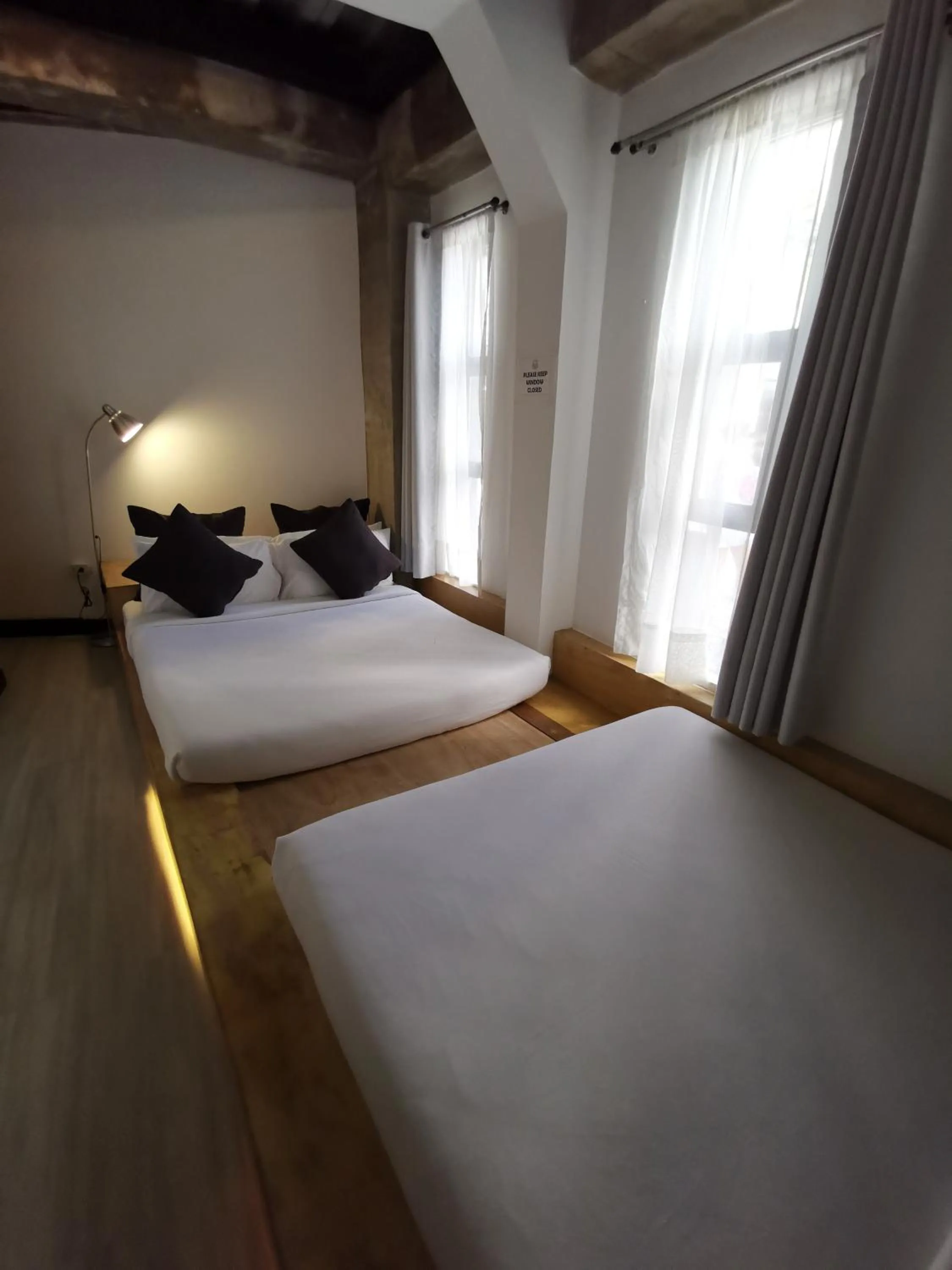 Bed in Urban Boutique Hotel