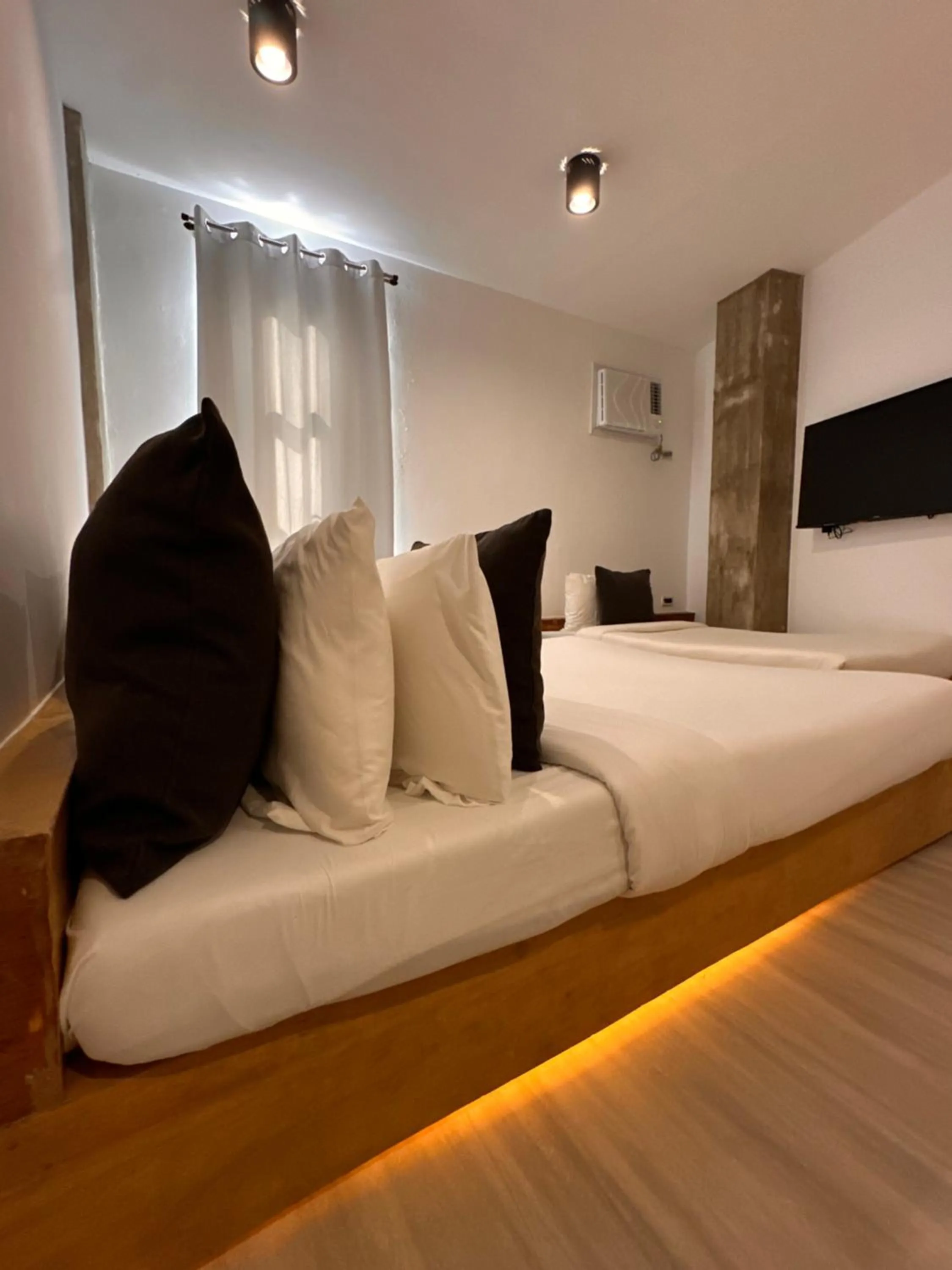 Bed in Urban Boutique Hotel