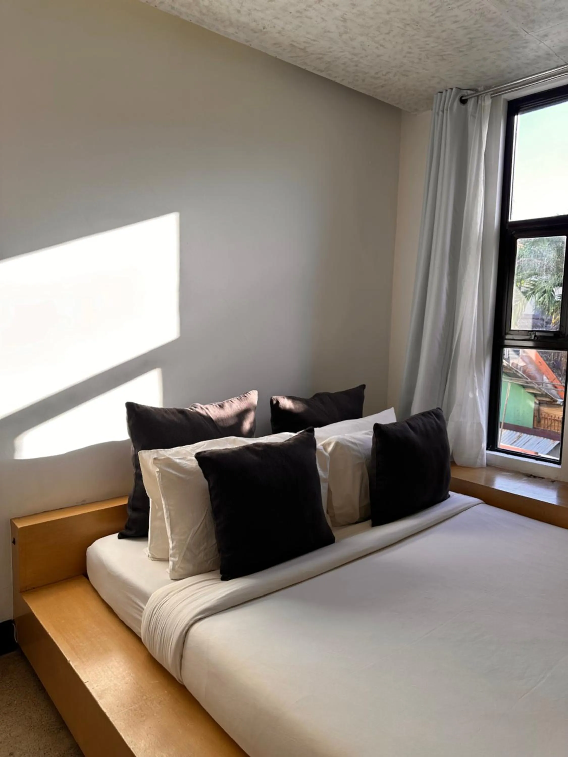 Bed in Urban Boutique Hotel