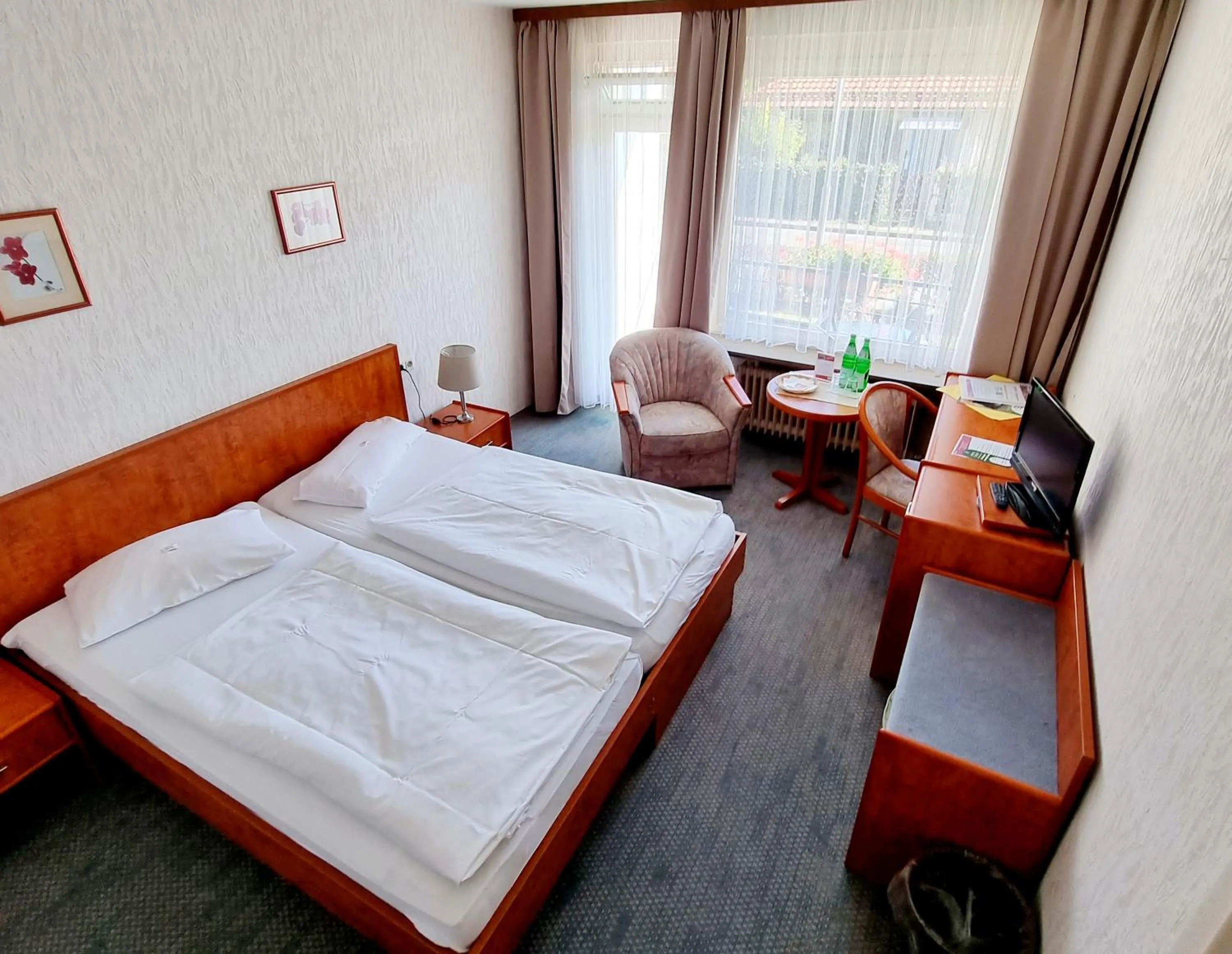 Bed in Hotel Heikenberg